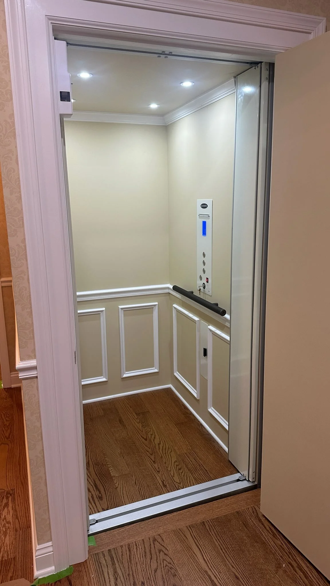Savaria Eclipse home elevator installation in York, PA by Keystone Accessibility with a custom interior molding and paint.