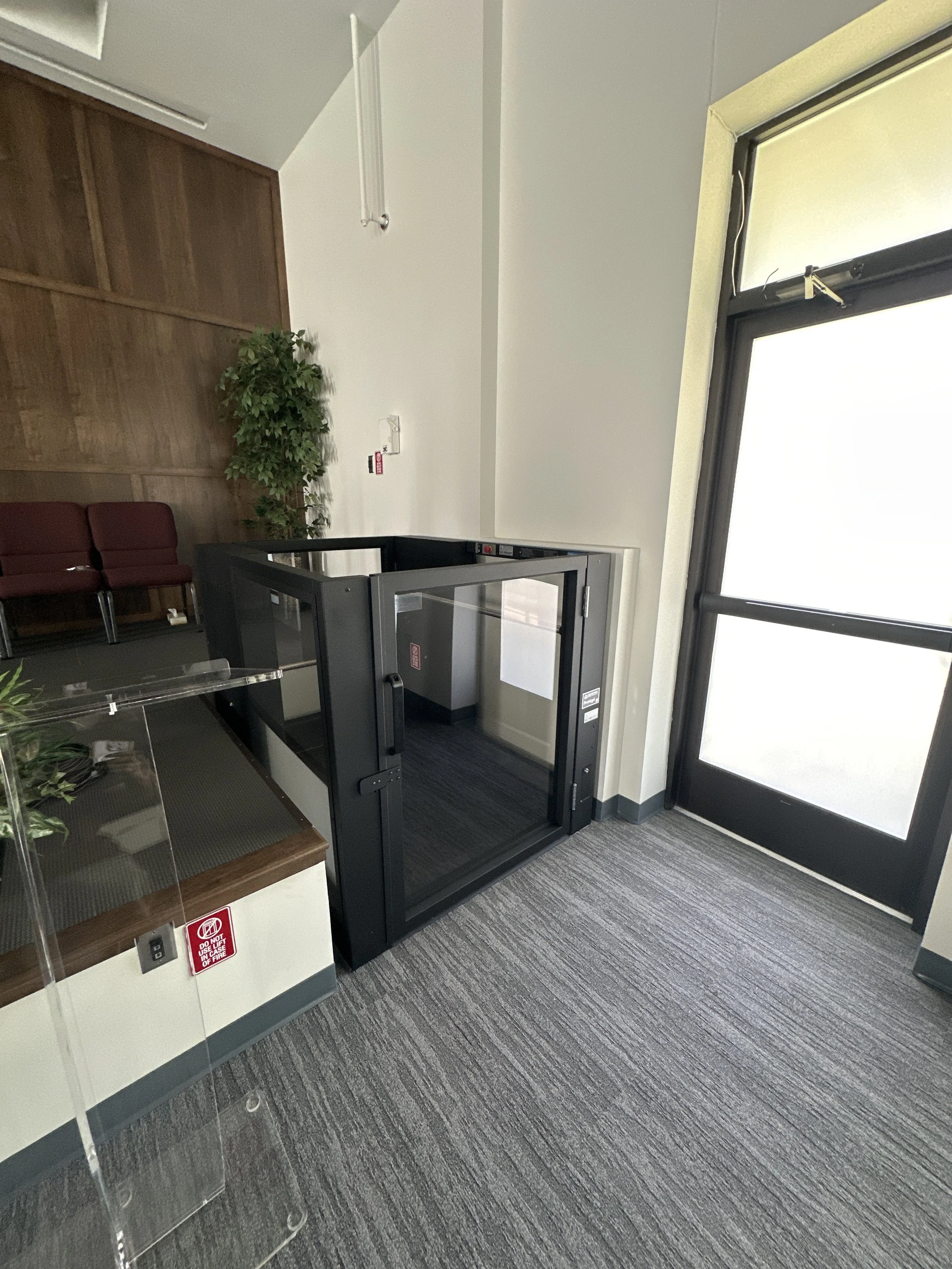 Commercial vertical platform lift called the ascension lift installed by Keystone Accessibility in a church in harrisburg PA.