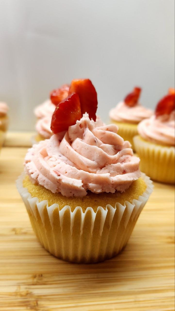 Vanilla Cupcakes with Strawberry Frosting