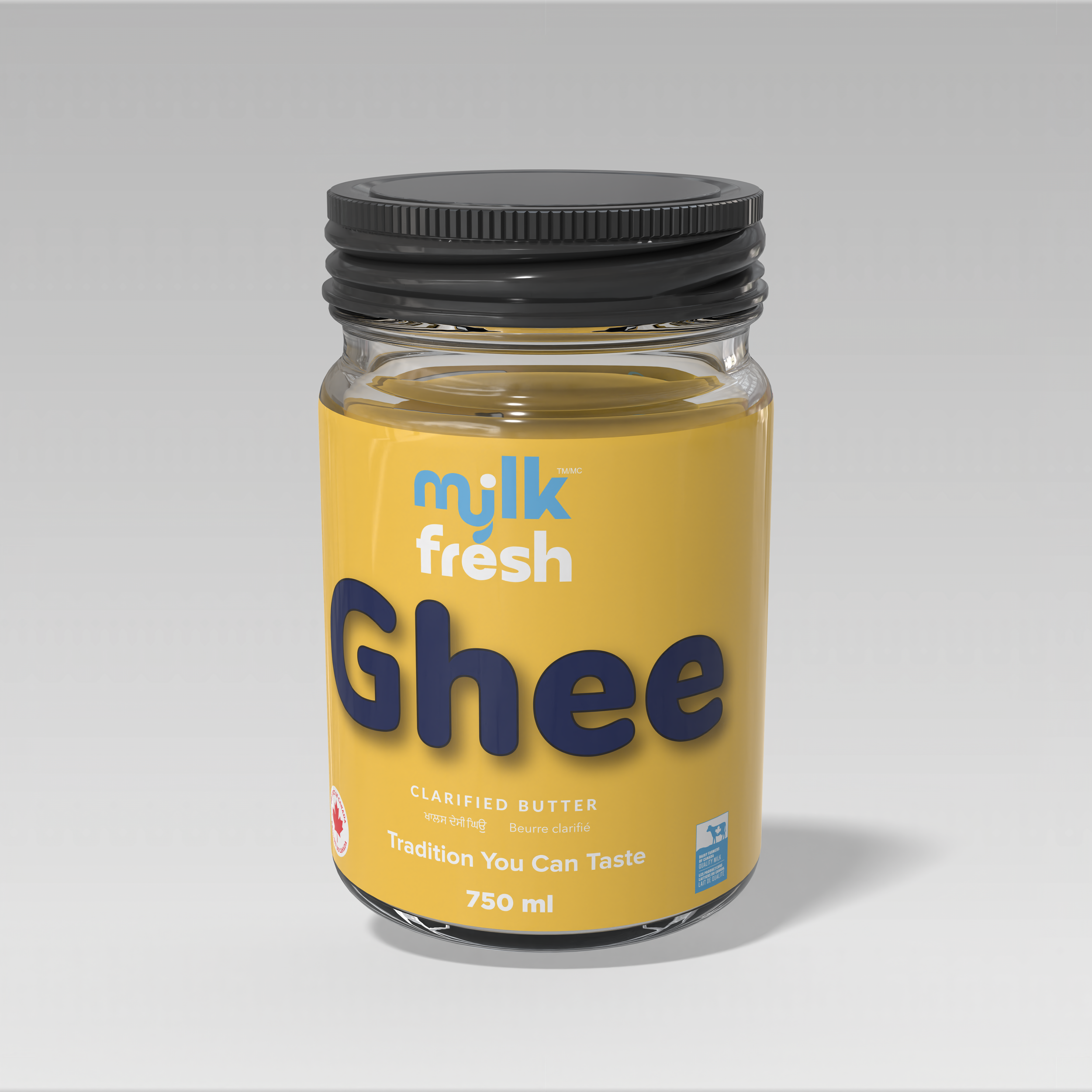 A jar of clarified butter labeled 'Ghee' with a yellow label and black lid.