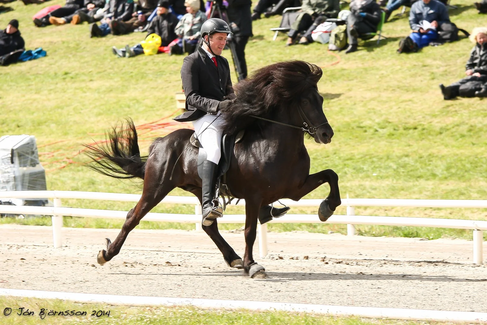 Sigurður Óli Kristinsson riding Hreyfill at the Landsmót 2014