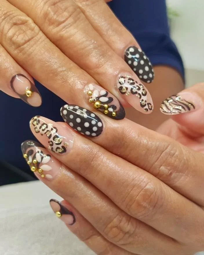 Dots, stripes &amp; a touch of gold &mdash; wild elegance at its finest 🖤✨