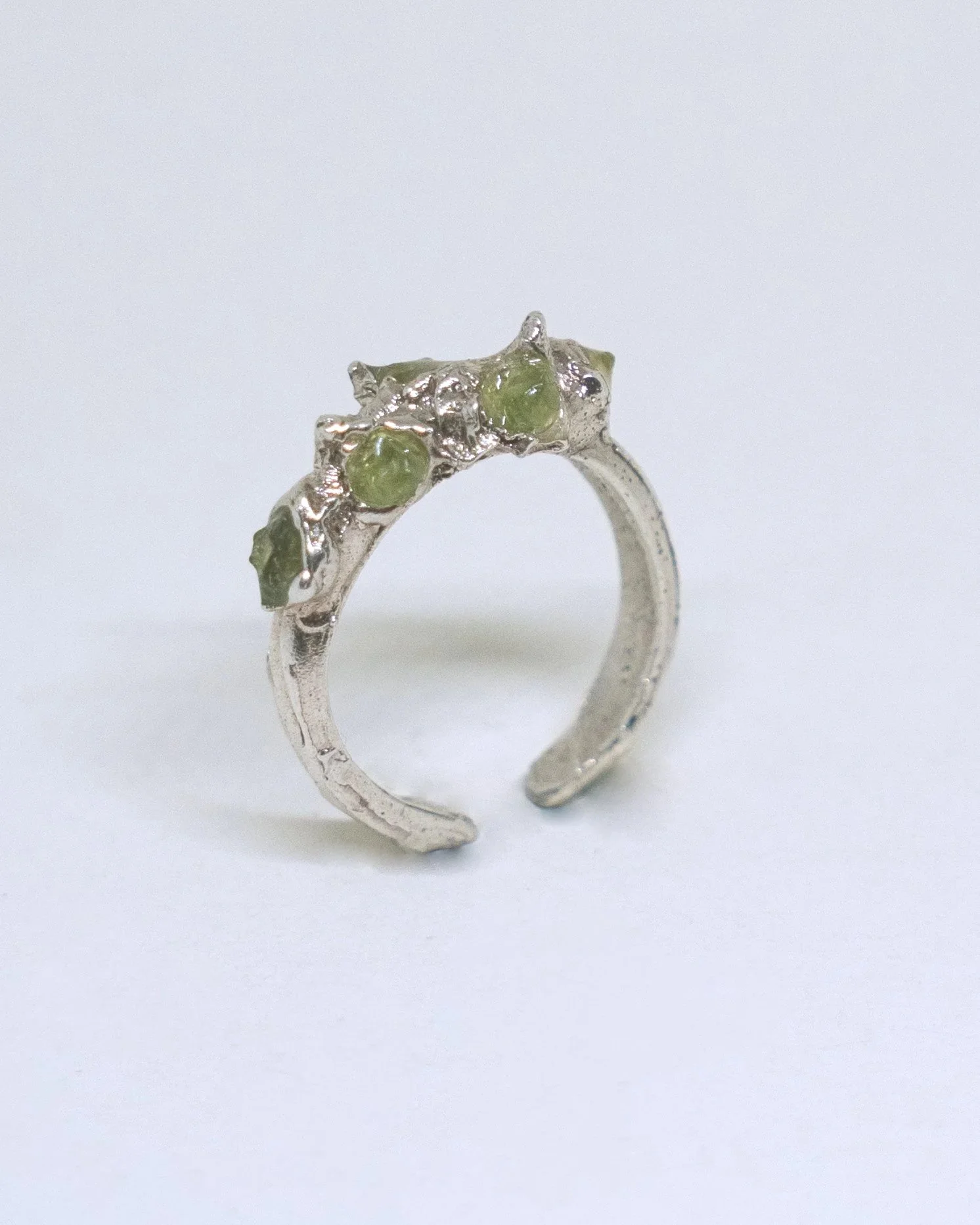 Handmade Harveya silver ring with olivine stone