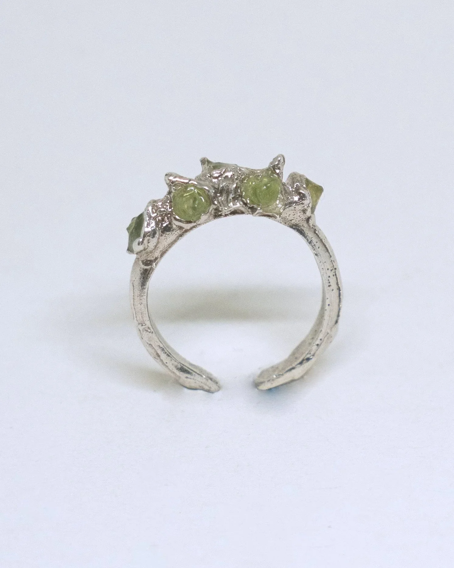 Handmade Harveya silver ring with olivine stone
