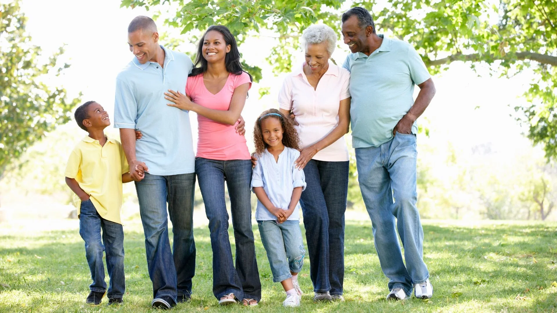 AA family walking grass.jpg