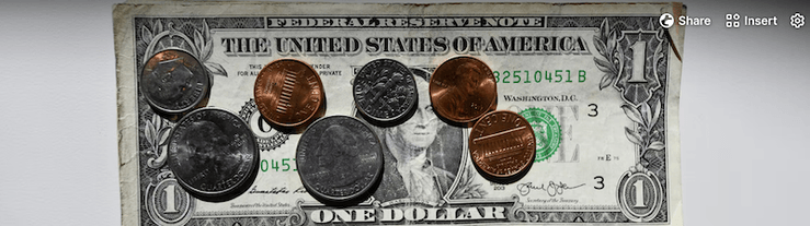 A worn one-dollar bill with several U.S. coins, like pennies and nickels—just enough to cover modest architect hourly rates.