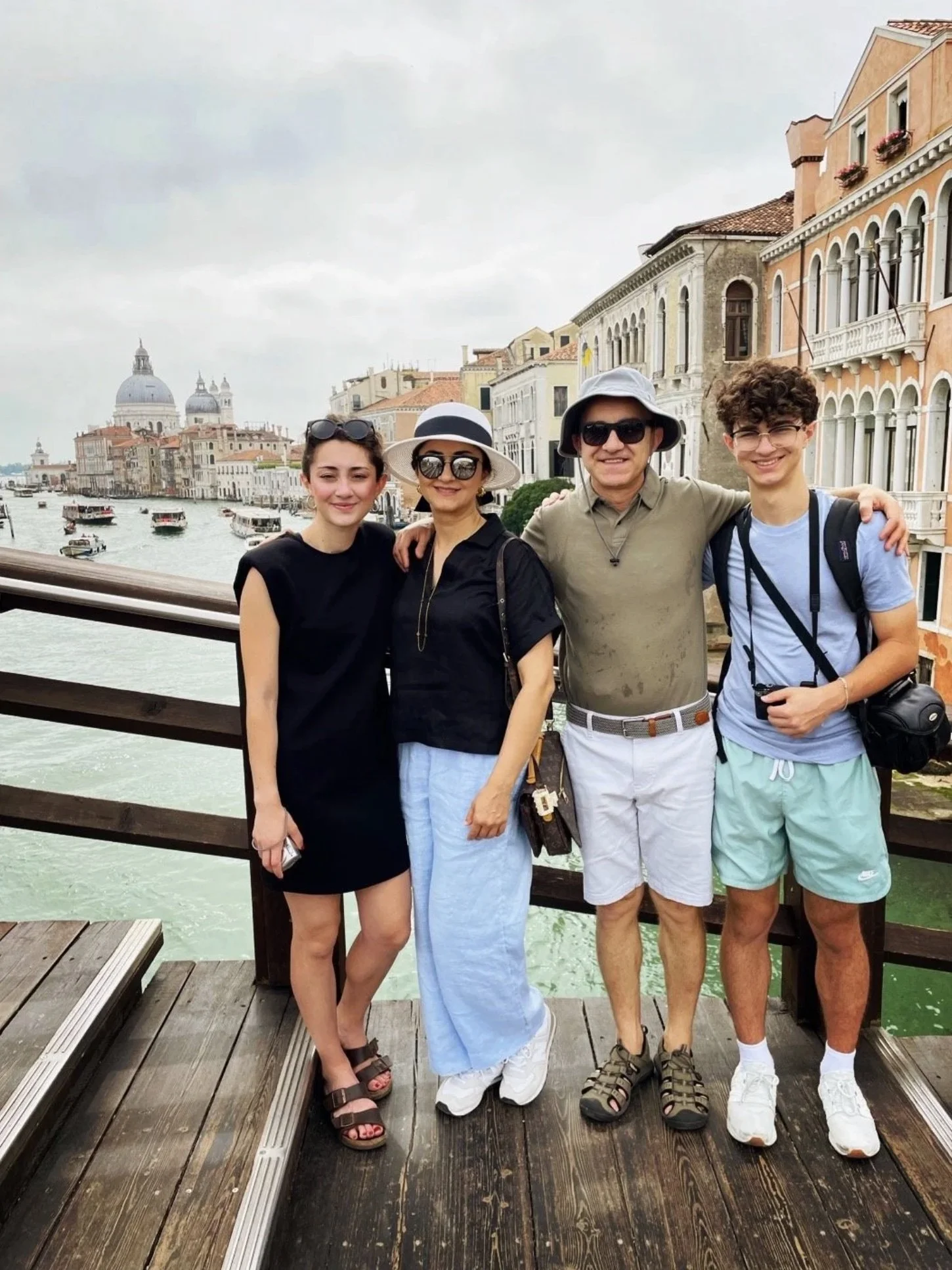 Dr. Farhad Hasan with his family in Venice — wife Baidaa, daughter Rand, and son Mateen