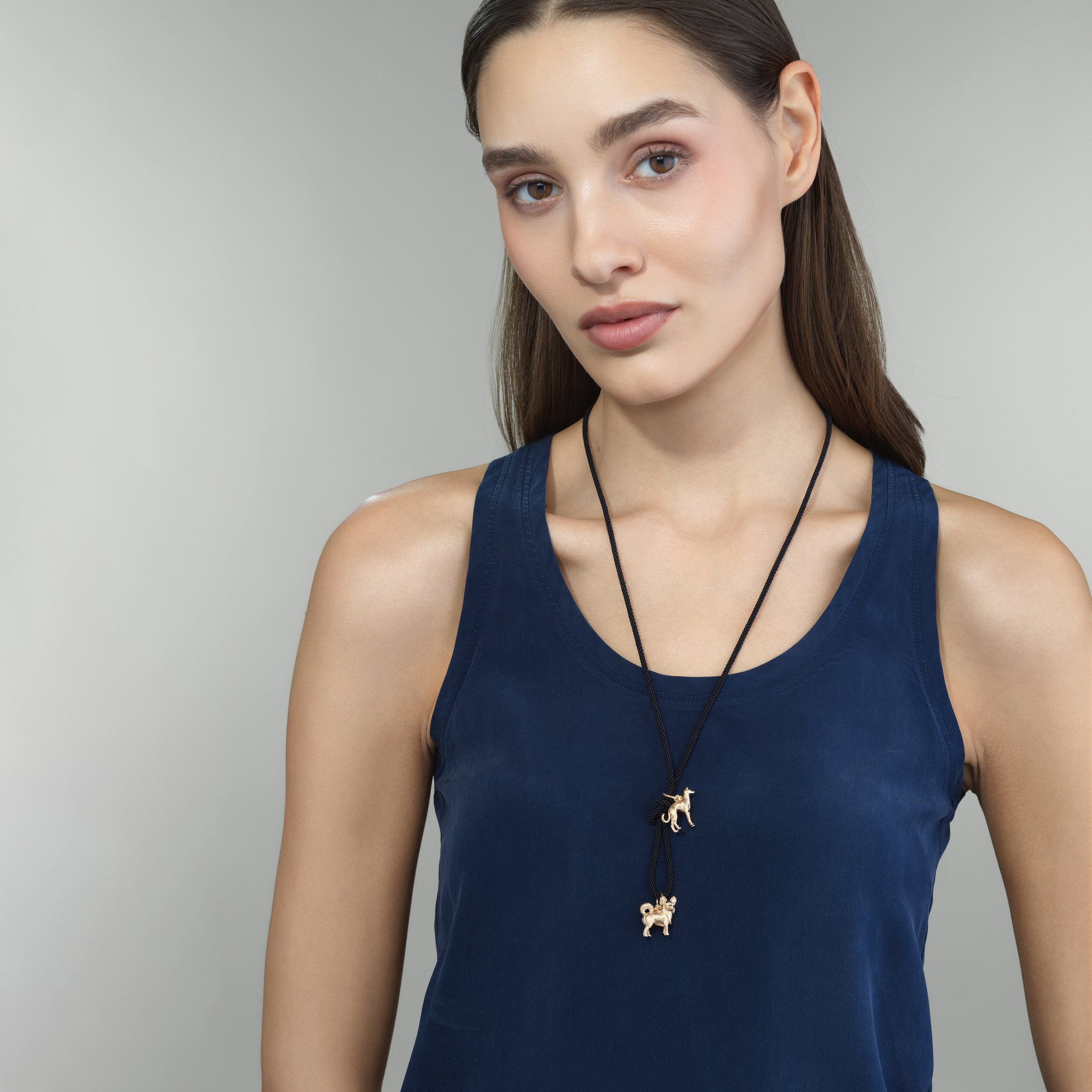 Black silk cord necklace shown worn on a model for scale