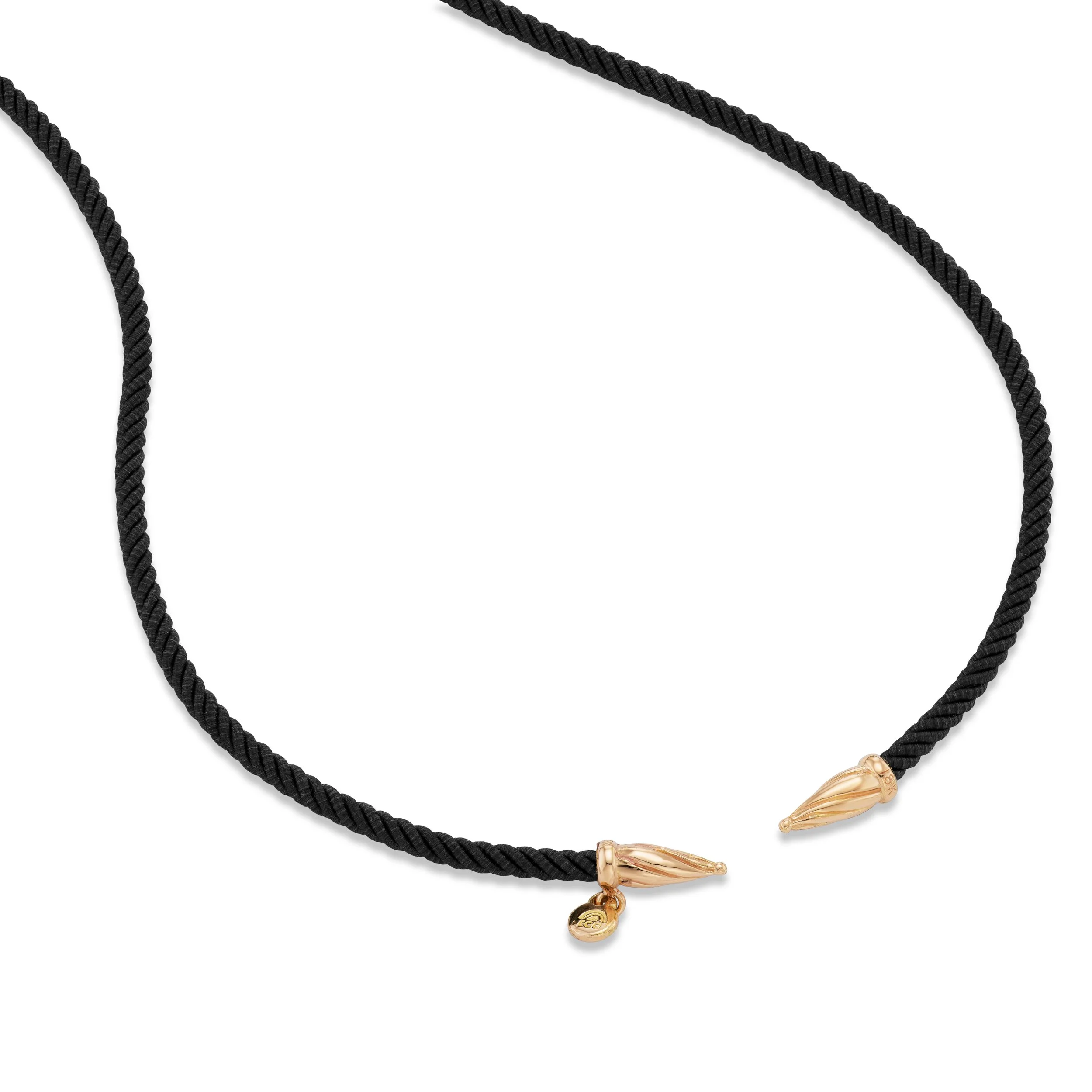 Black silk cord necklace with 18k gold ends, close-up view