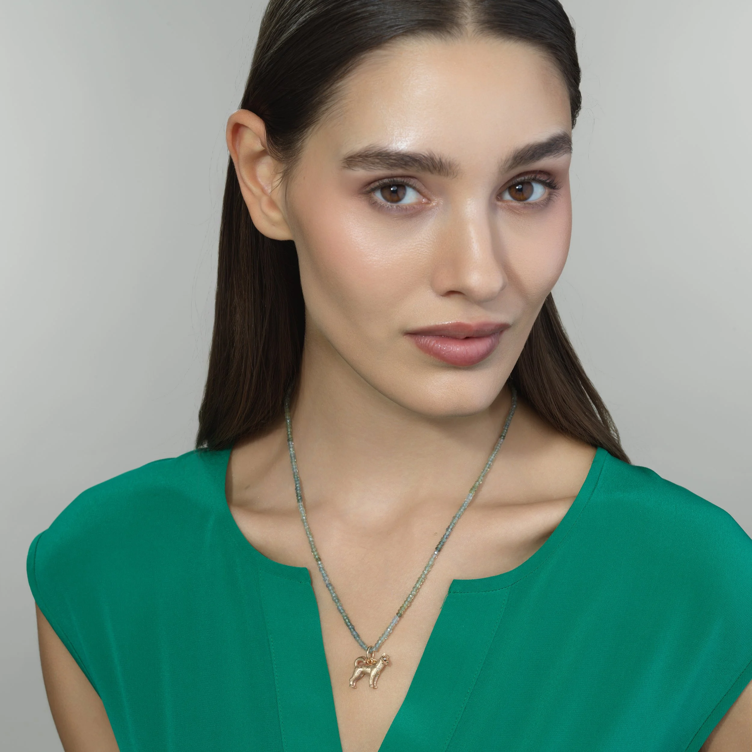 Montana sapphire bead necklace shown worn on a model for scale