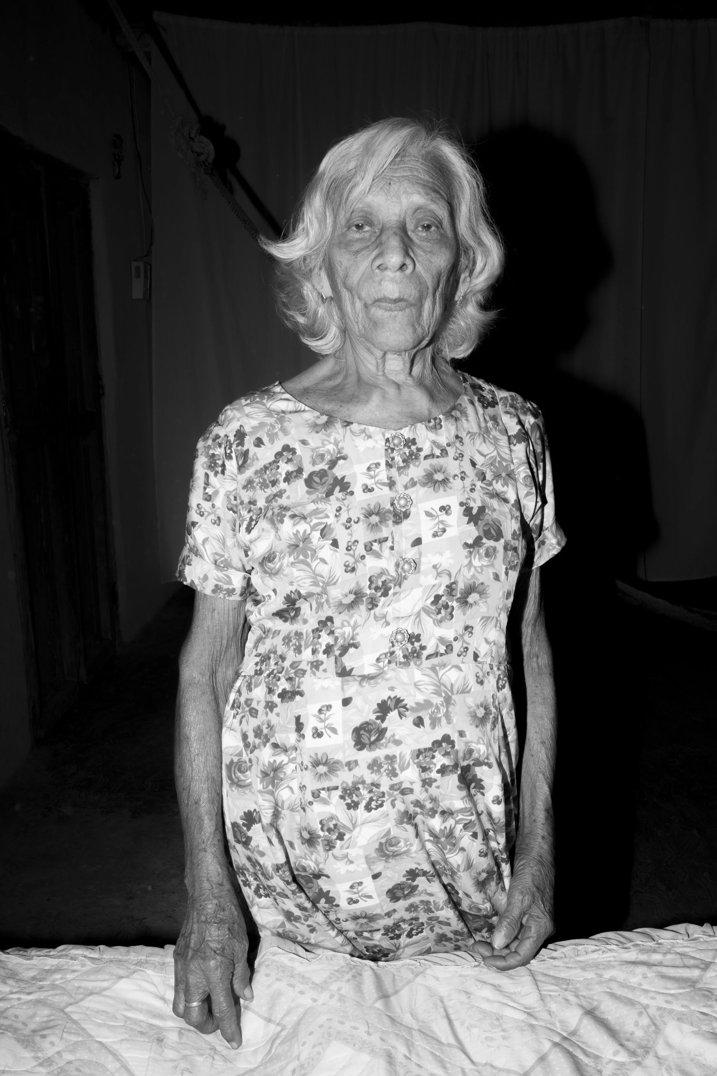 Mama Gregoria. Her son in law, Abelardo, is missing. For a year she was held captive and enslaved in her own house by the army when more than 500 soldiers occupied her town. San Martin de las Flores, Gro.