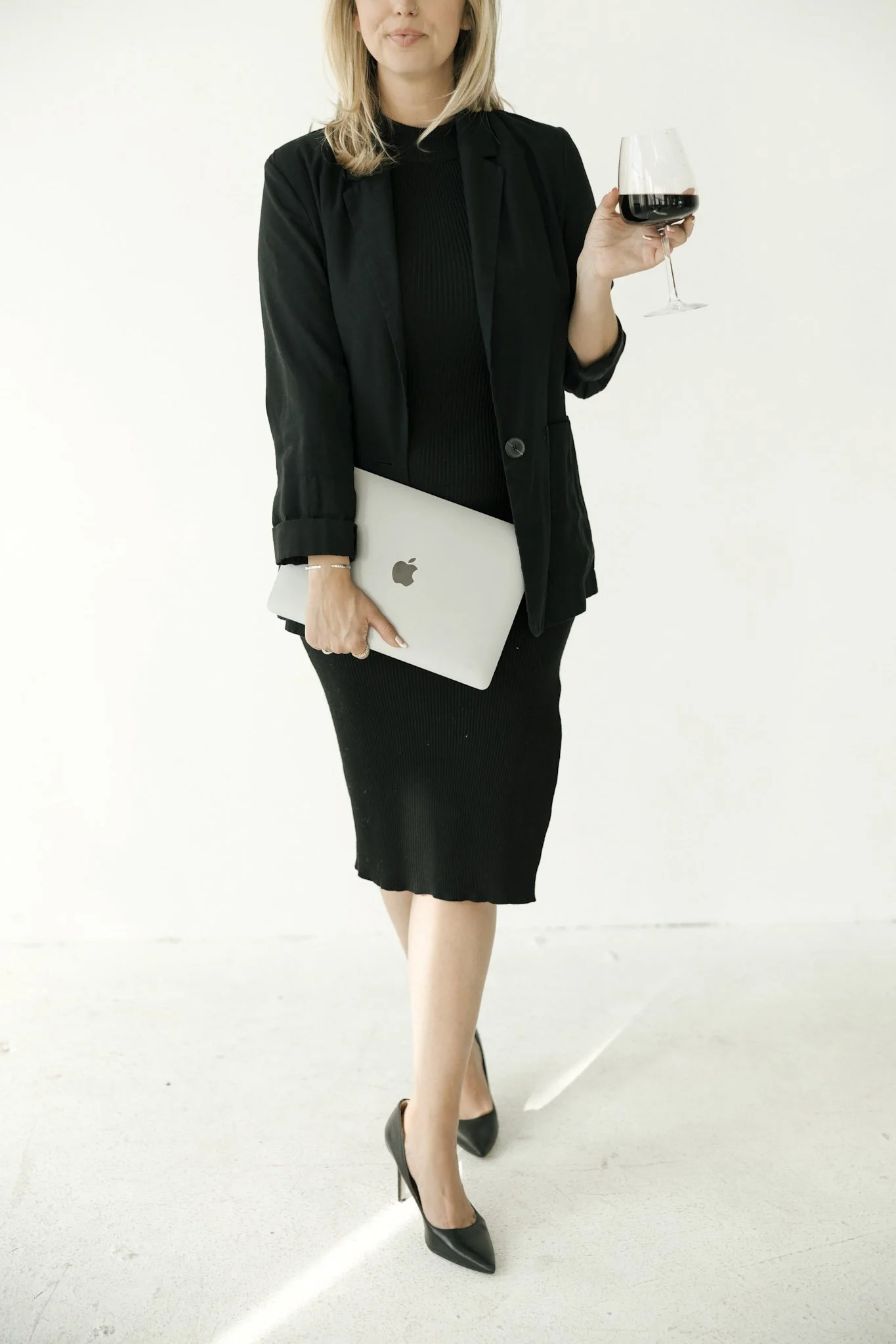 Professional business consultant with laptop representing marketing strategy and documentation services