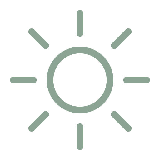 A simplified icon of the sun with rays extending from a circle.