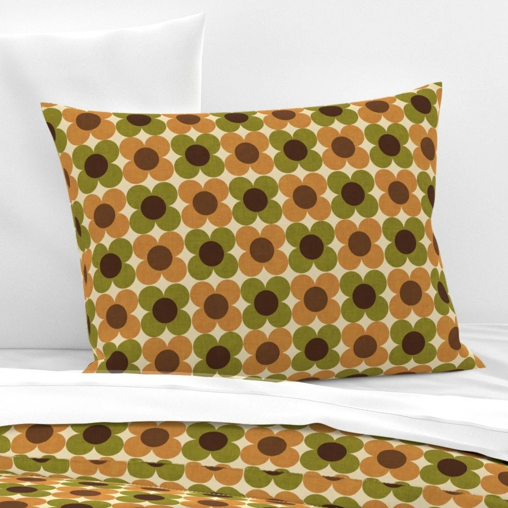 matching pillow and duvet with 70s chrochet flower pattern in green and brown