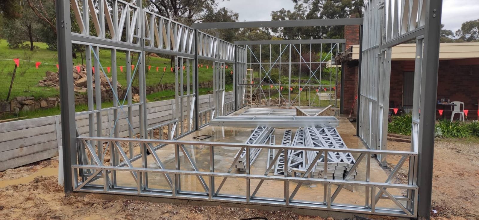 Construction of the meditation hall and views of the completed building.