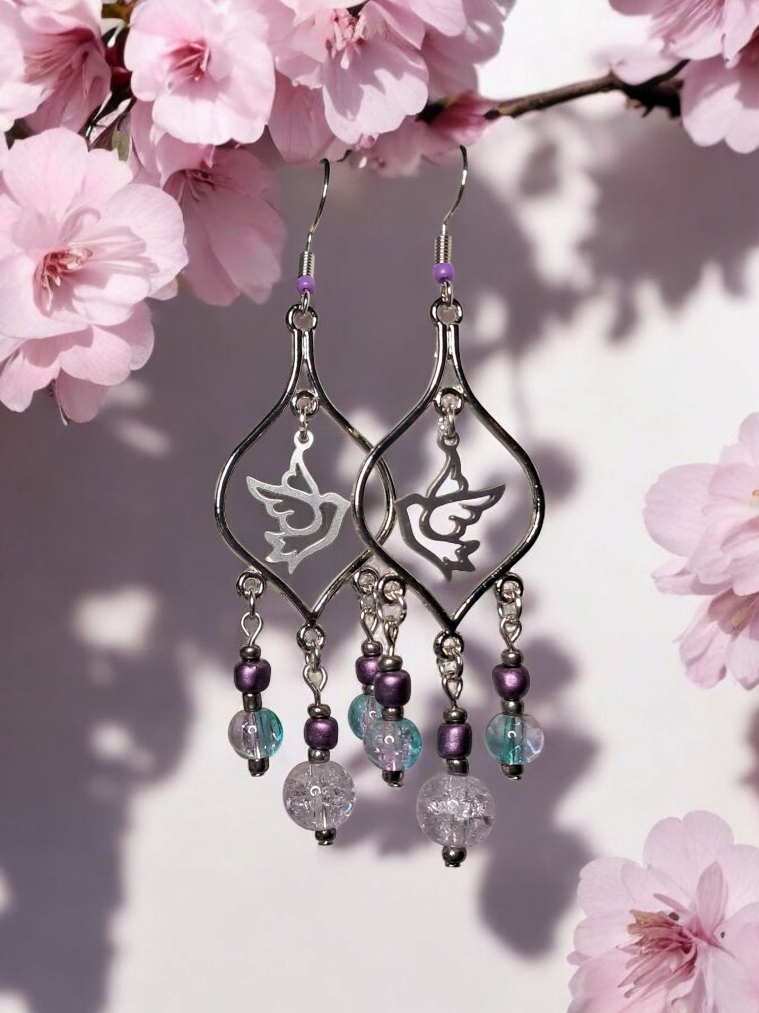 purpletealholyspiritchandaleirearrings.png
