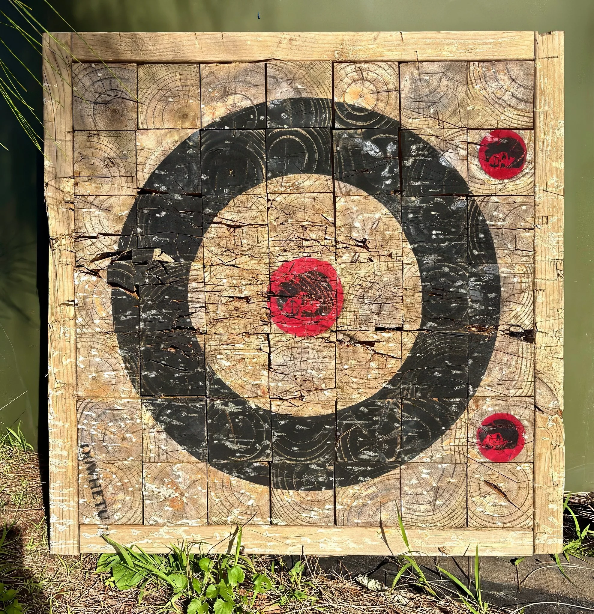 Axe throwing entertainment area, Black Swamp glamping retreat Northland