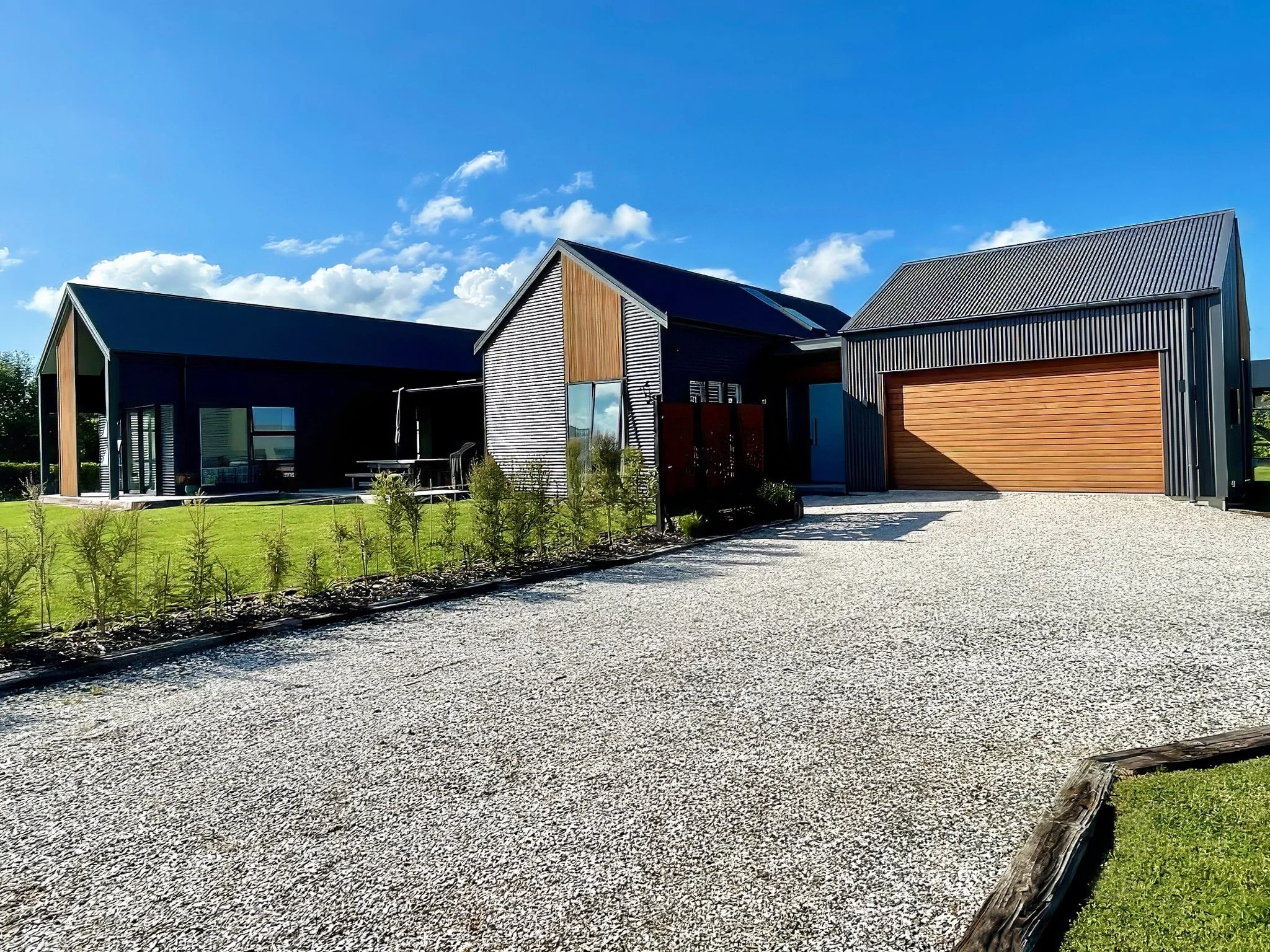 New home build with exposed aggregate driveway, Elite Building Mangawhai