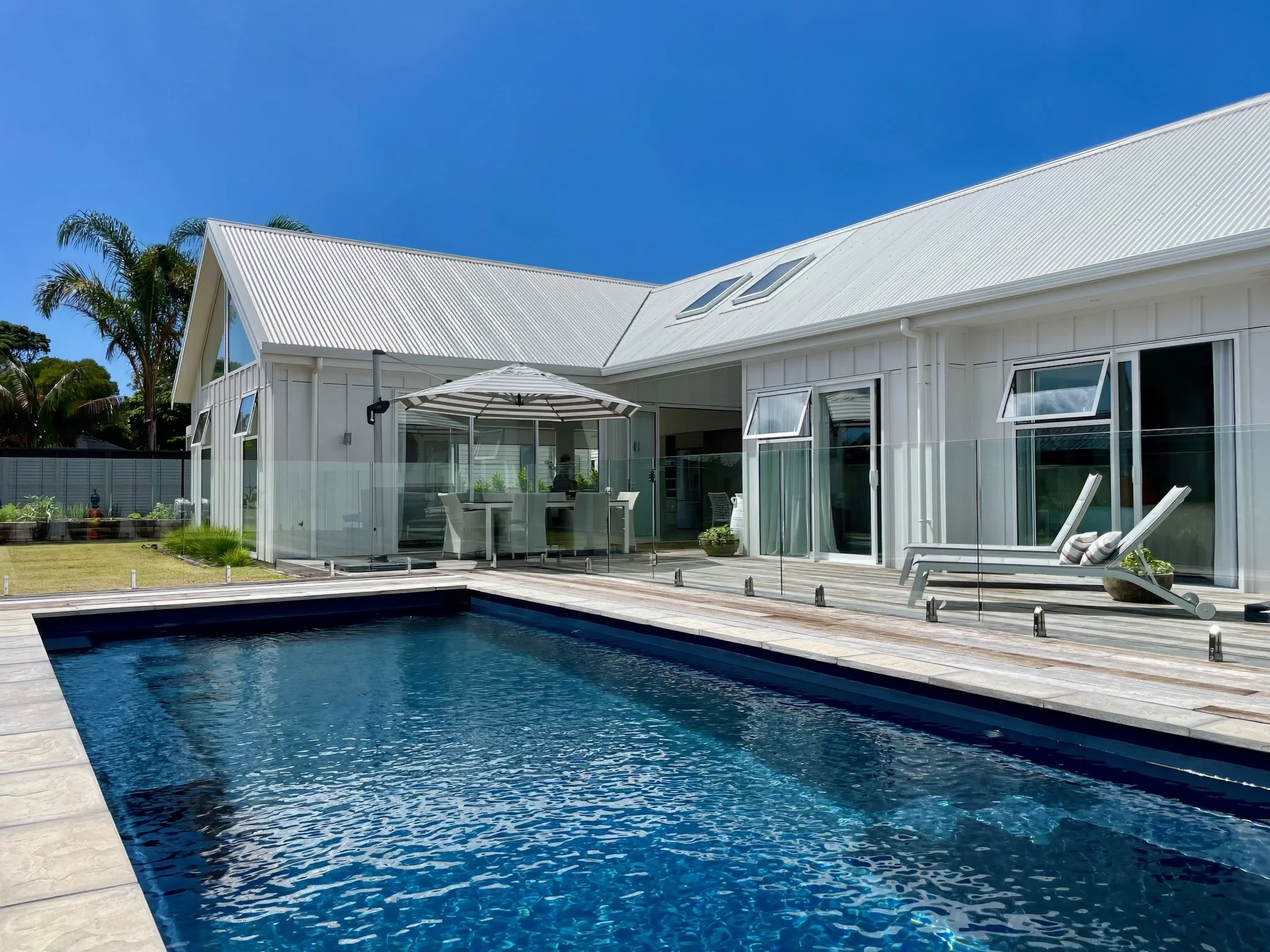 Luxury new home with swimming pool and outdoor living, Elite Building Mangawhai