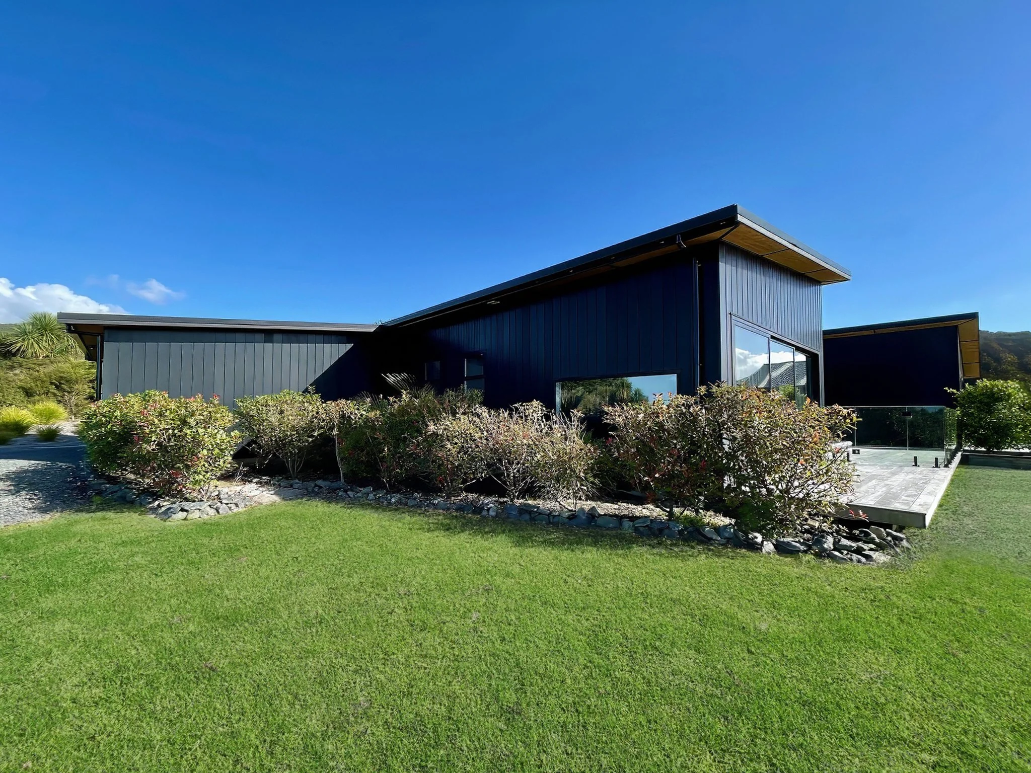 Sanctuary Ridgeview luxury new home exterior view with rural surroundings, Northland