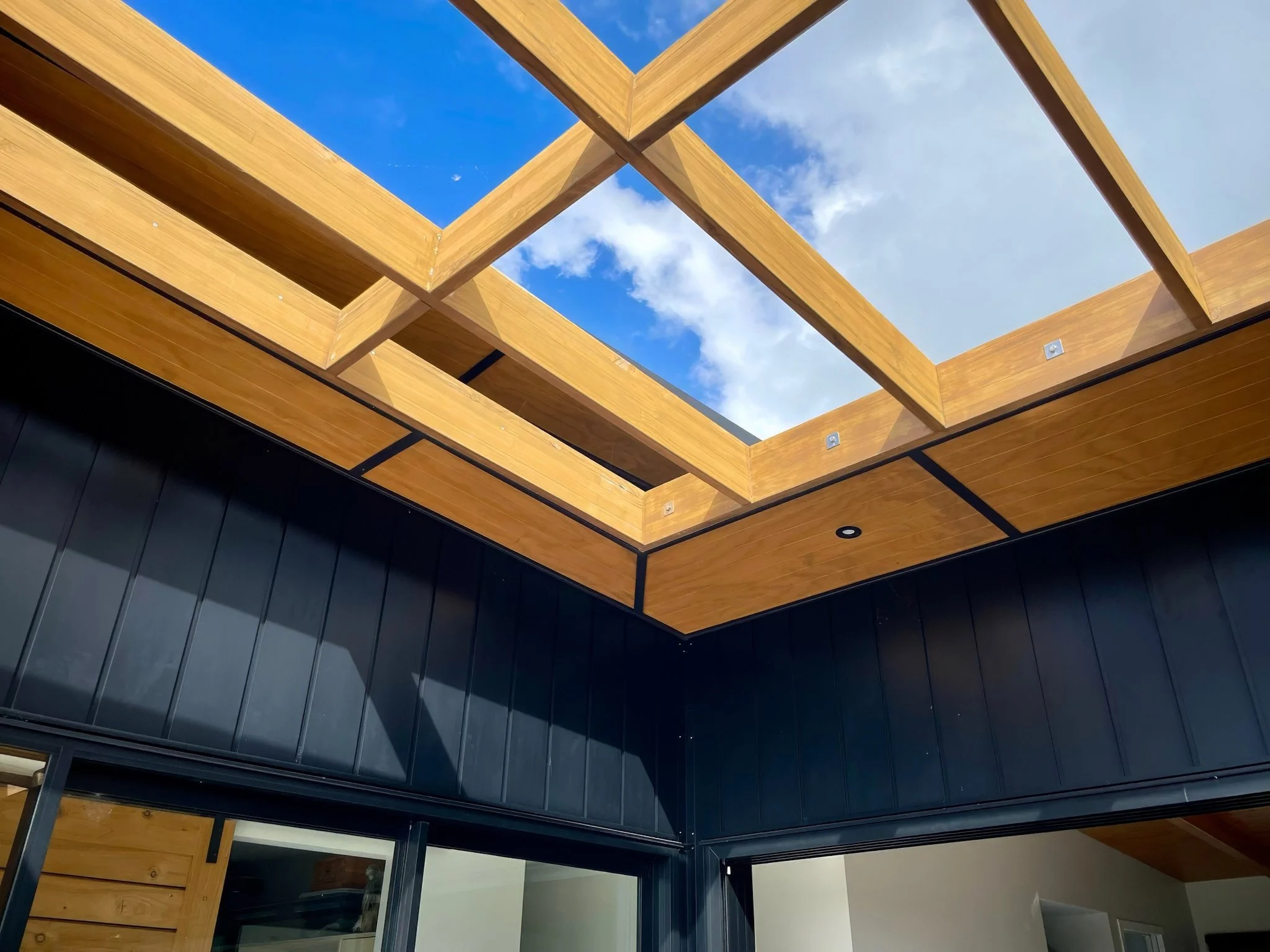 Sanctuary Ridgeview luxury new home timber battens skylight, Elite Building Northland 