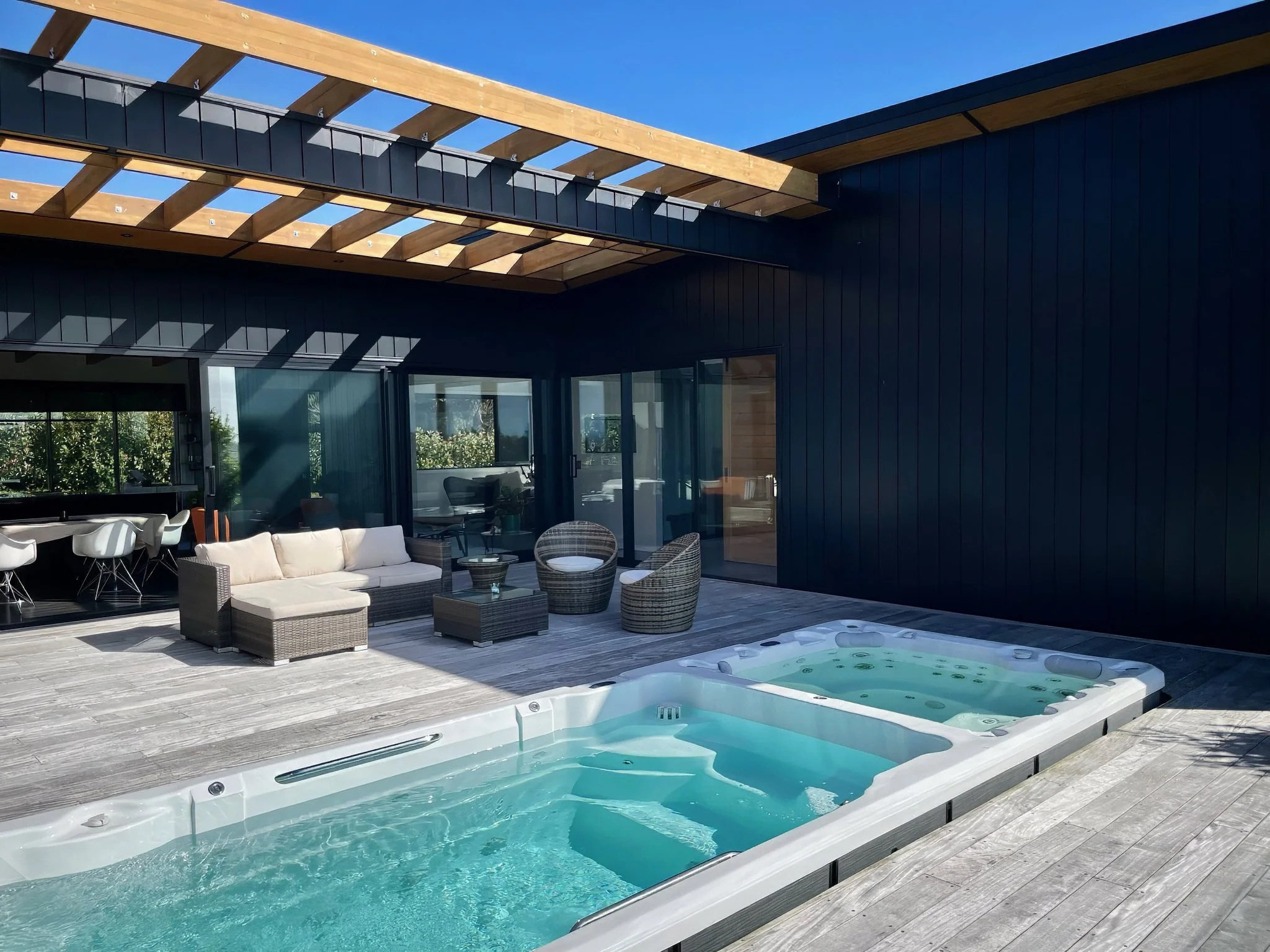 Sanctuary Ridgeview luxury new home with swimming pool and  timber battens, Elite Building Northland