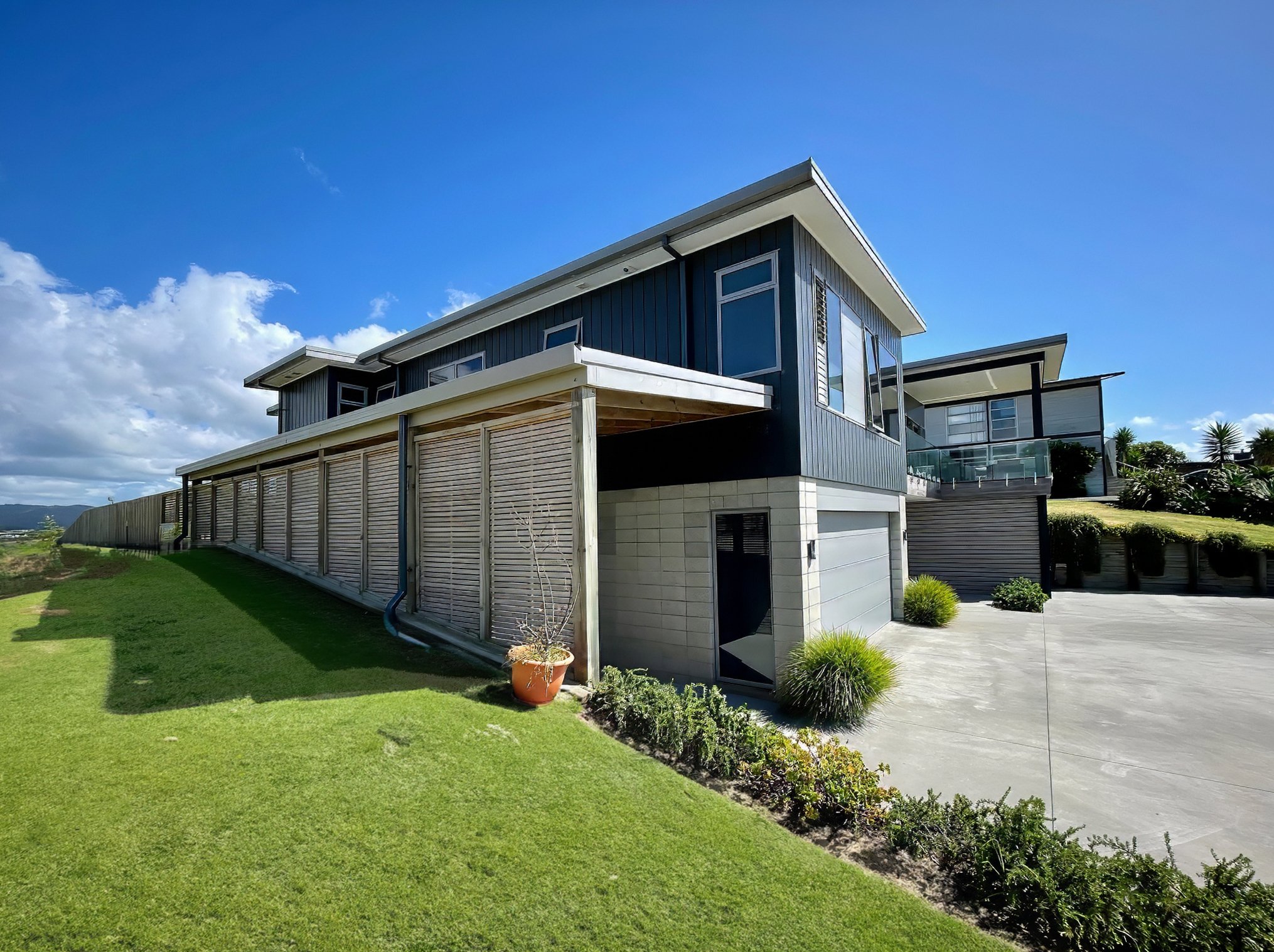 Driftwood luxury new home full exterior with car port, Mangawhai