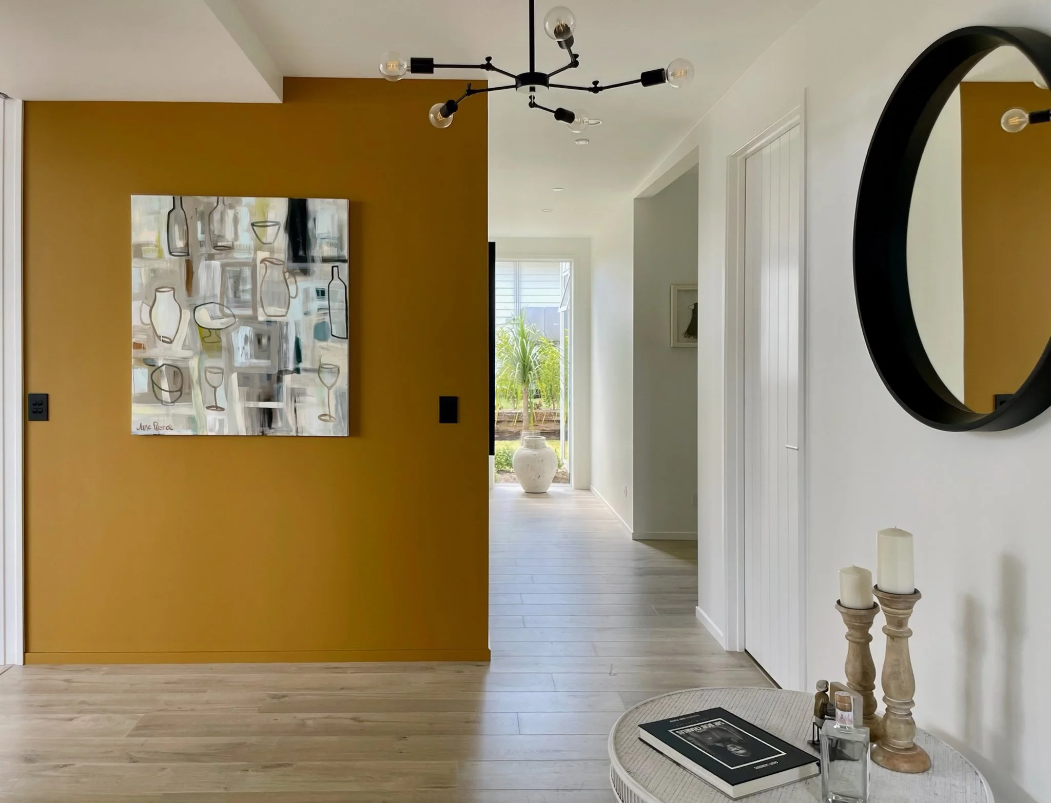 Swordfish new home interior with original artwork and timber flooring, Elite Building Northland