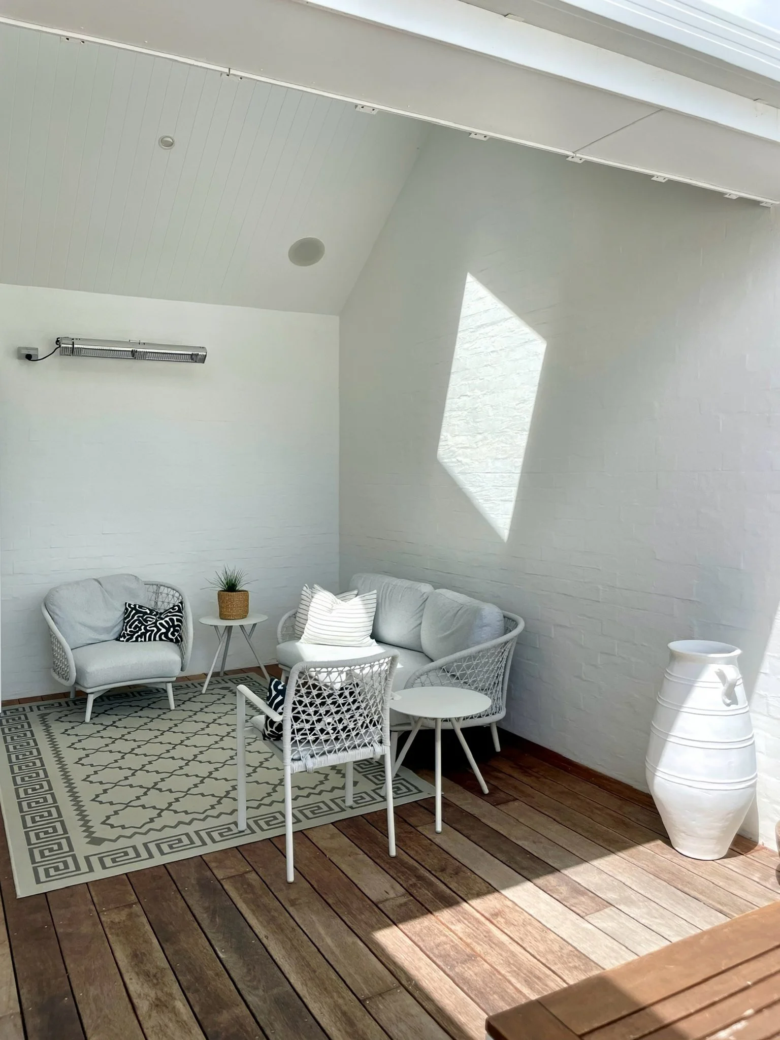 Swordfish outdoor seating lounge area, Elite Building Mangawhai