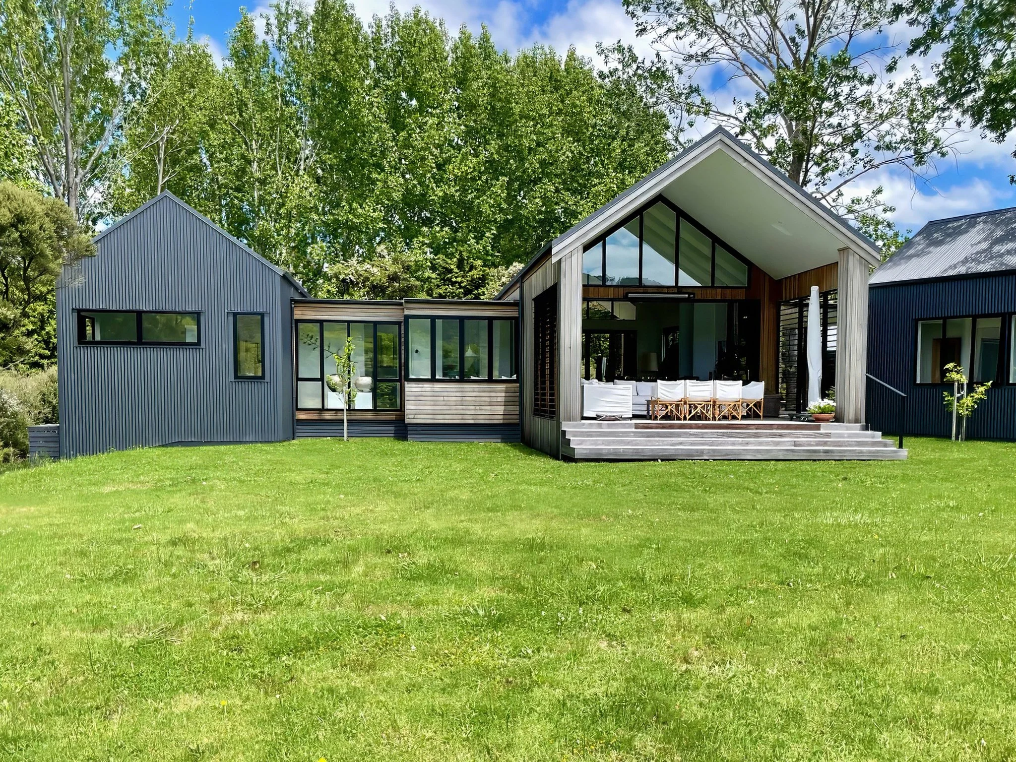 Waiotahi Drive luxury new home exterior with gabled roof and timber cladding, Elite Building Mangawhai