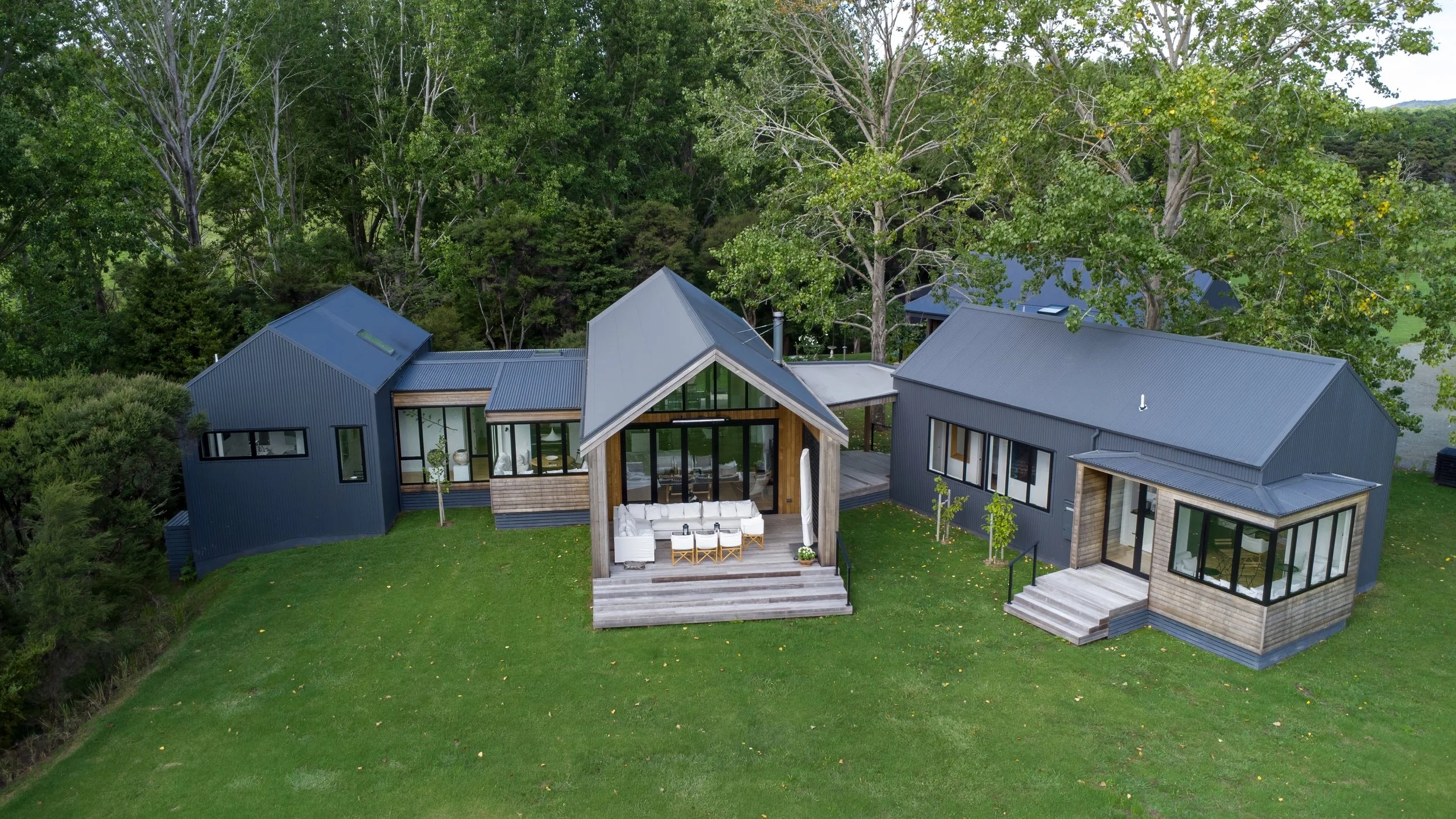 Aerial view of Waiotahi Drive luxury new home build with gabled roof, Elite Building Northland