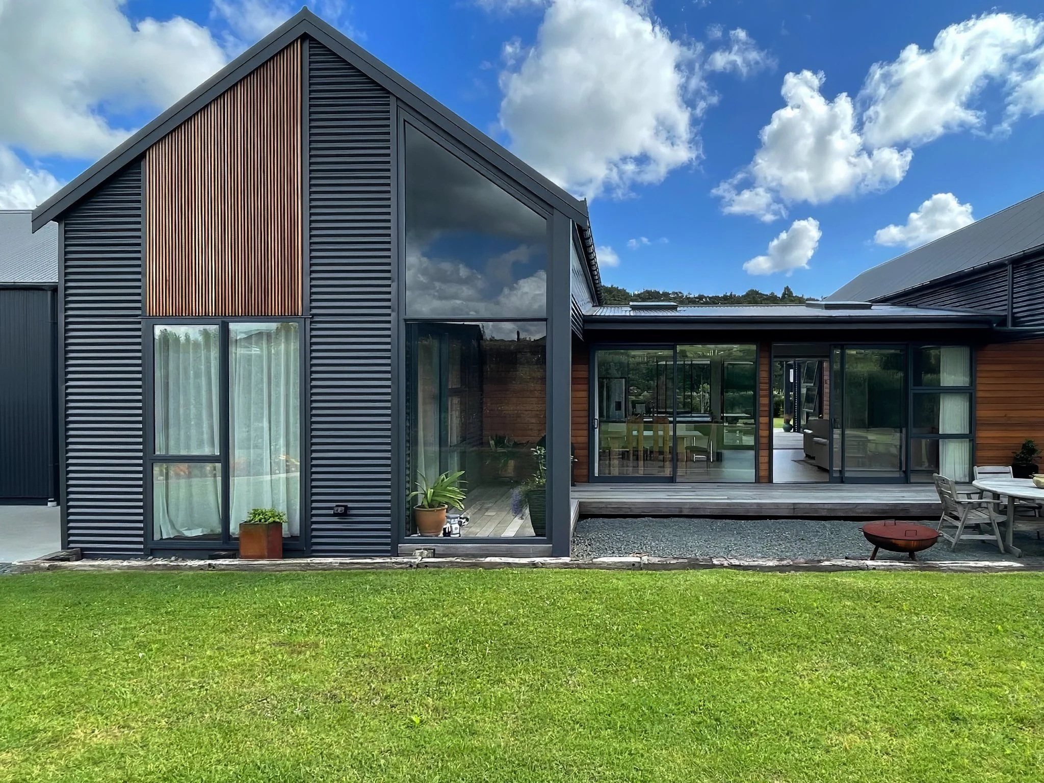 Alexandra Lane luxury new home exterior with manicured gardens, Elite Building Mangawhai