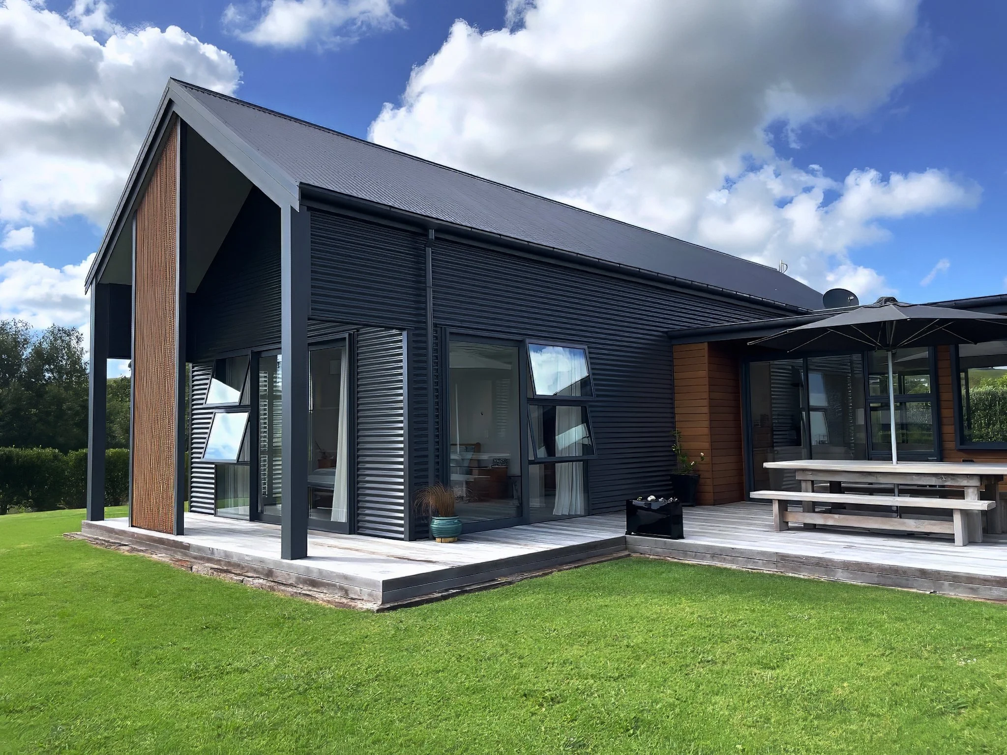 Alexandra Lane luxury new home with cedar and colour steel, Elite Building Mangawhai Northland