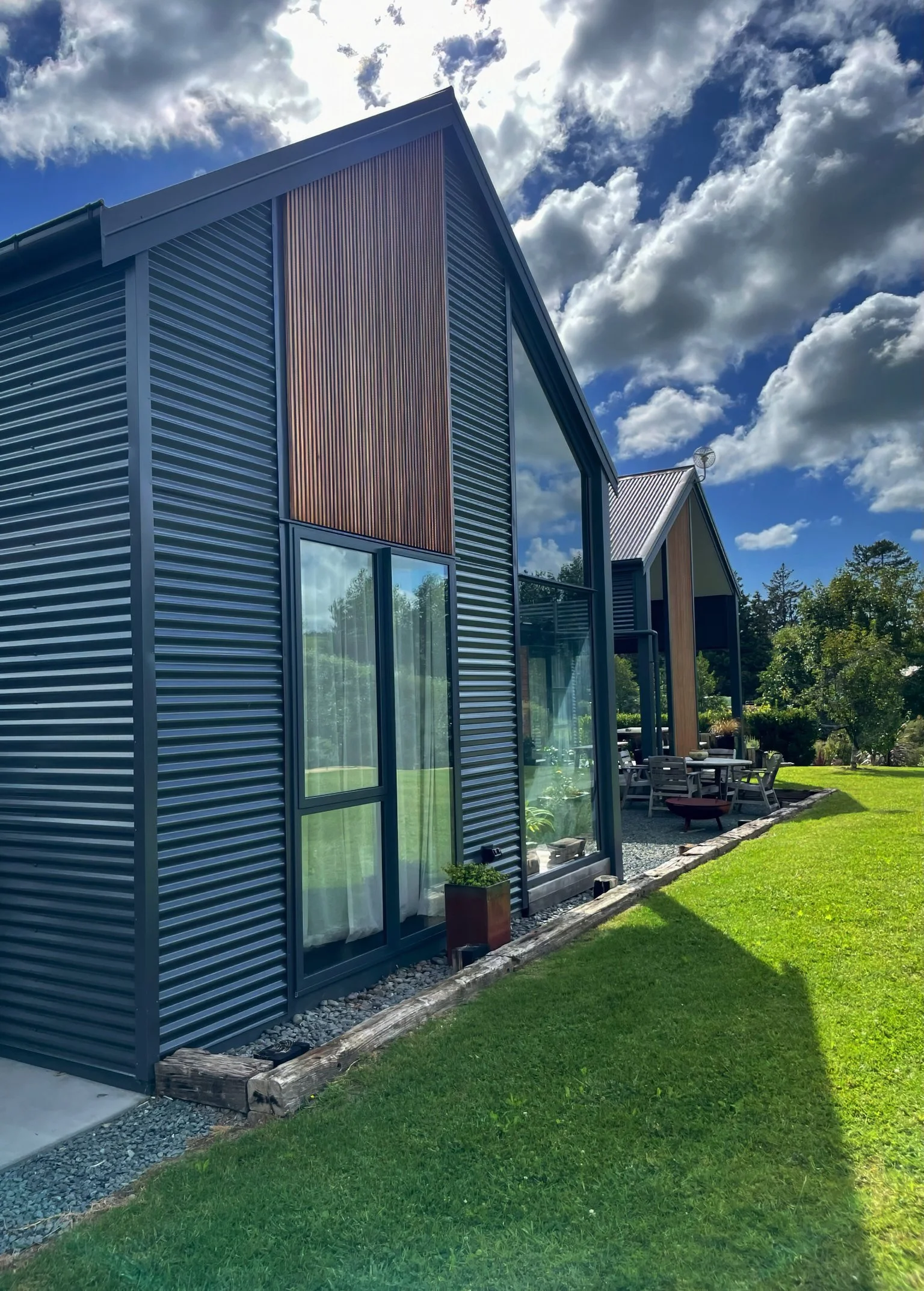 Alexandra Lane new home cedar cladding and floor to ceiling windows detail, Elite Building Northland