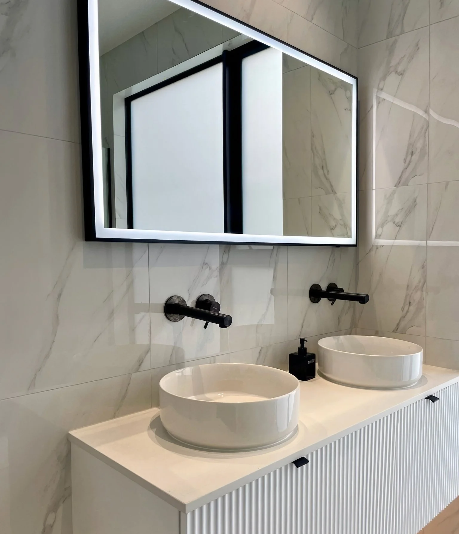 Sand Dune luxury ensuite with stone basin and black tapware, Northland
