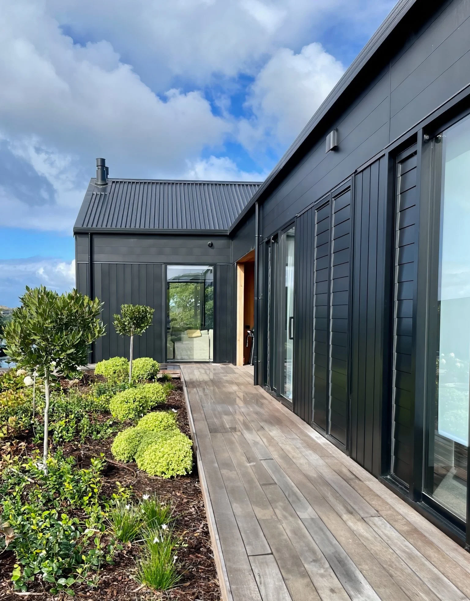 Sand Dune new home boardwalk with tropical garden planting, Elite Building Mangawhai