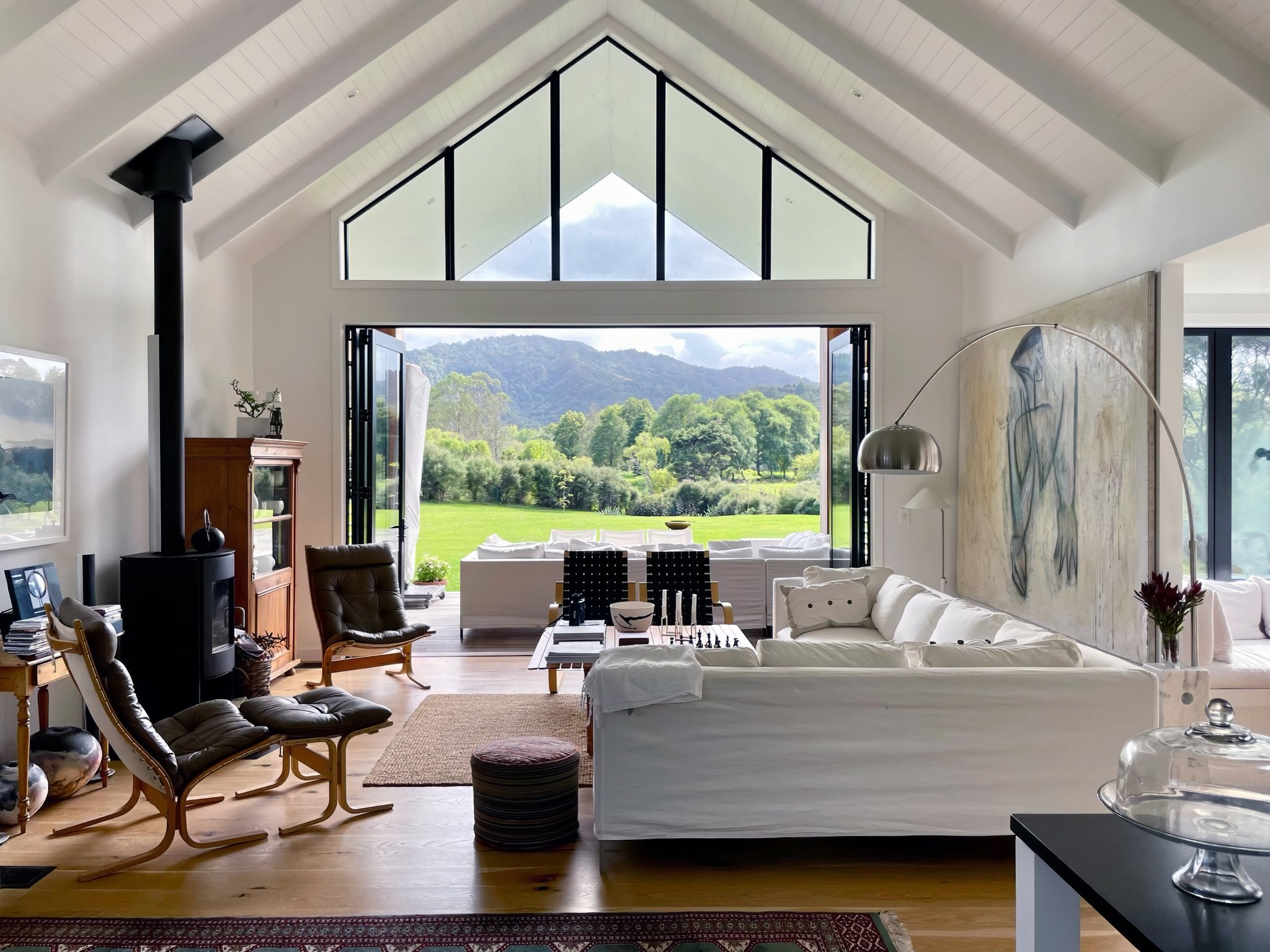 luxury home interior lounge room with nectre woodburner fireplace