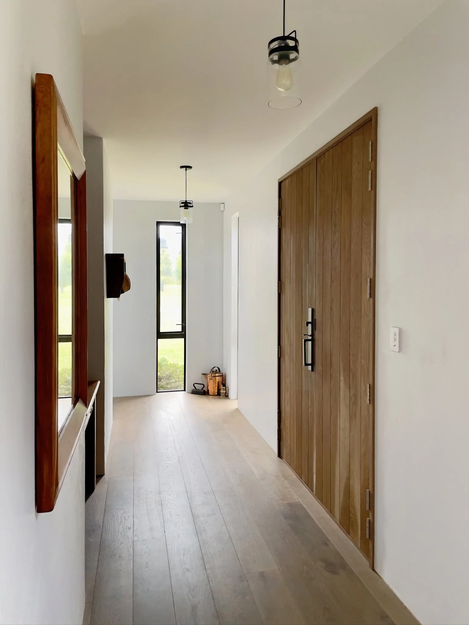 luxury home made with Porotherm blocks imported from Europe garage interior hall and front door
