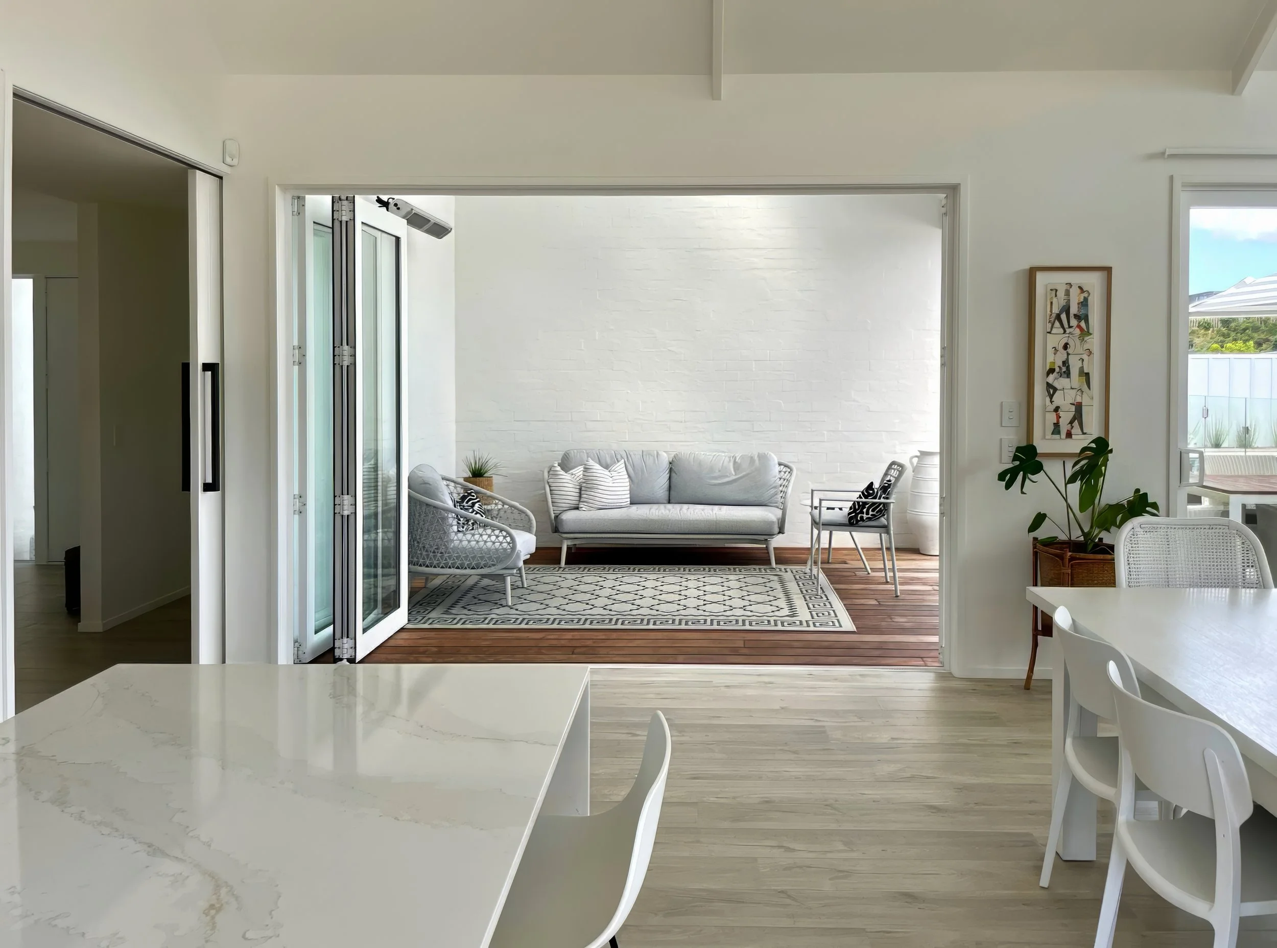 New home interior with bifold doors opening to outdoor living, Elite Building Mangawhai