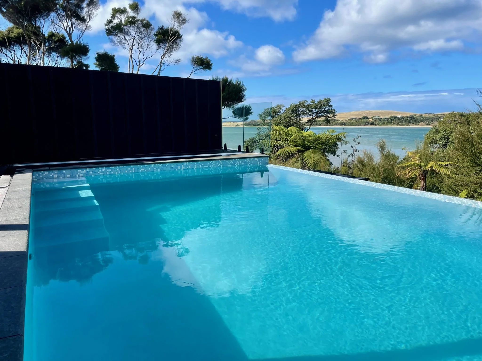 Sand Dune luxury swimming pool and landscaped gardens, Mangawhai