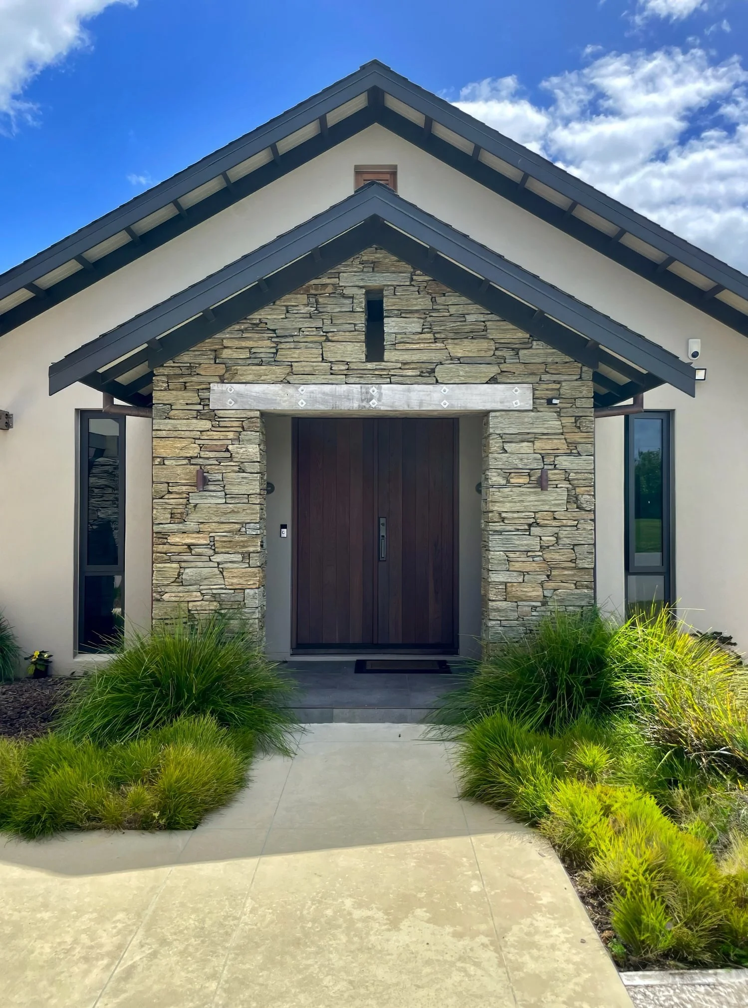 Sanctuary Lakeview luxury new home entry with stone cladding detail made with Porotherm blocks imported from Europe , Mangawhai