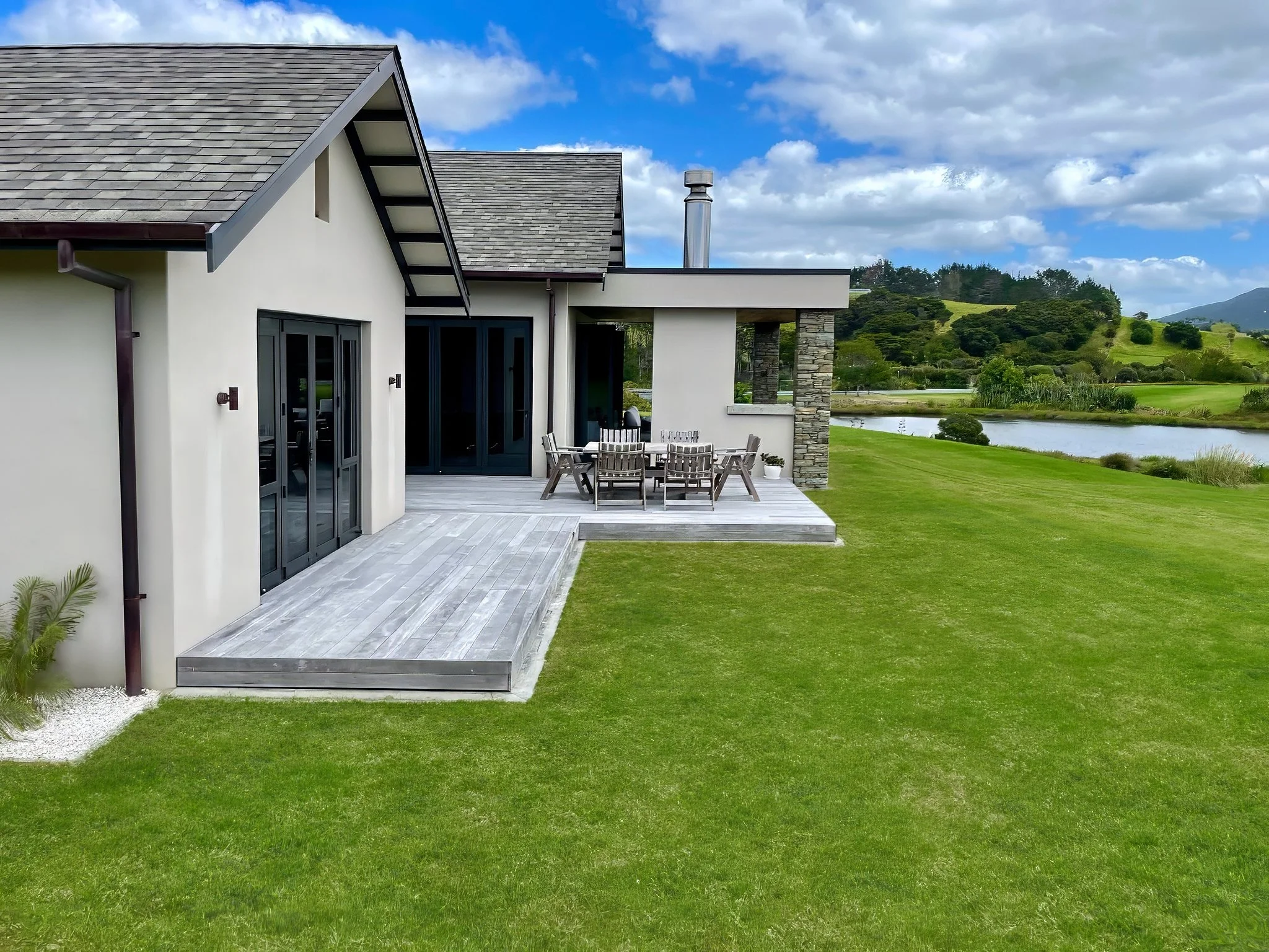 luxury home made with Porotherm blocks imported from Europe exterior lake view