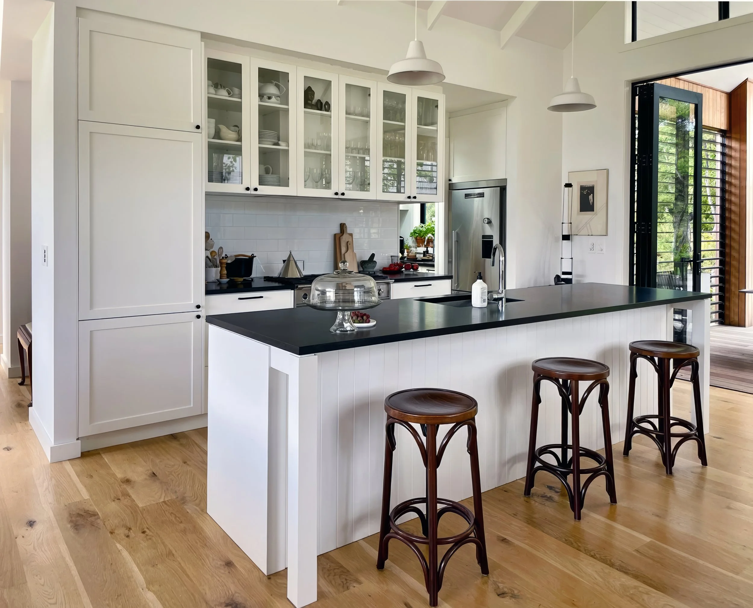 Luxury white kitchen with glass cabinetry, Waiotahi Drive new home Elite Building Mangawhai