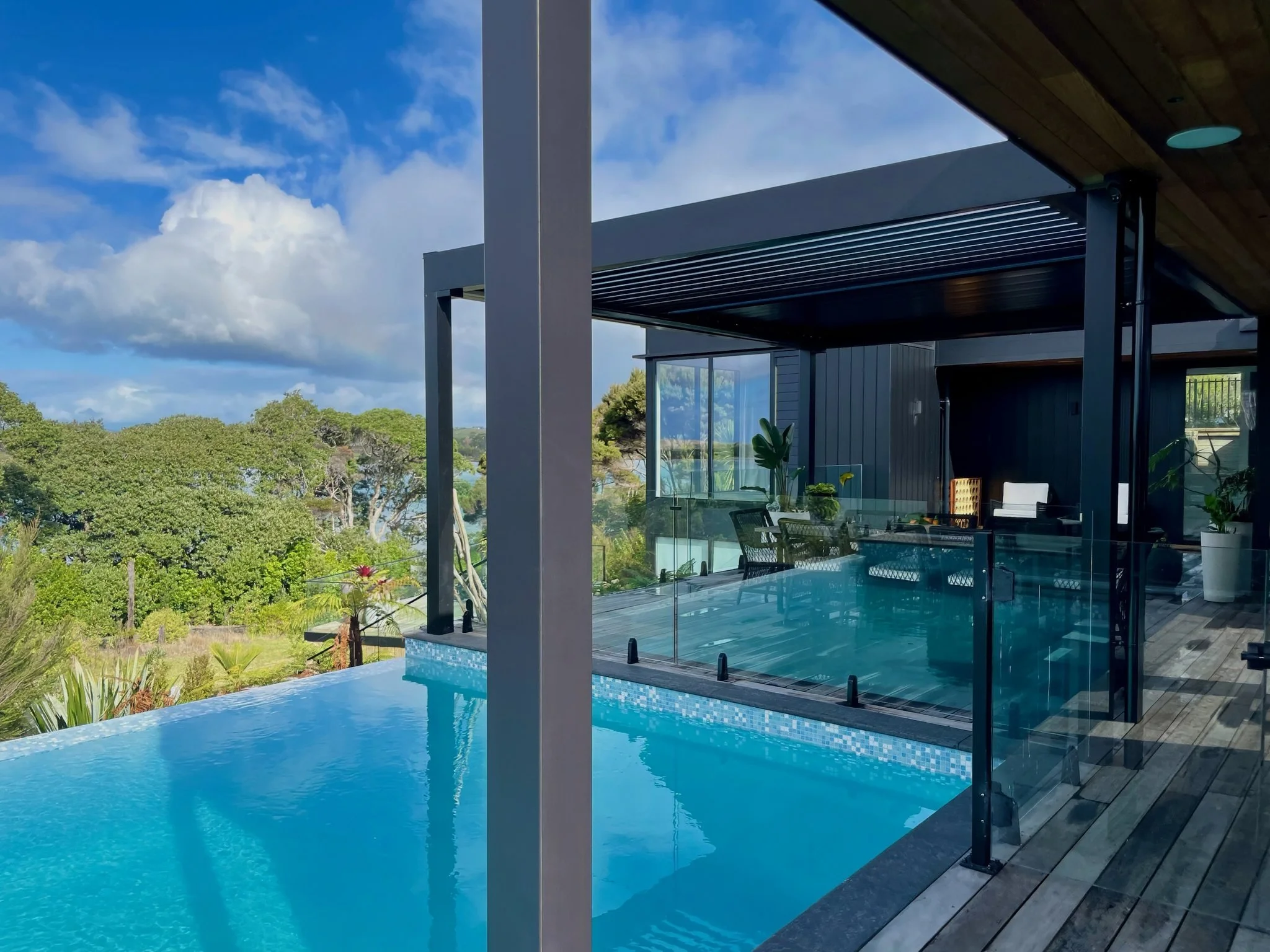 Sand Dune new home pool with glass fencing and outdoor living, Mangawhai