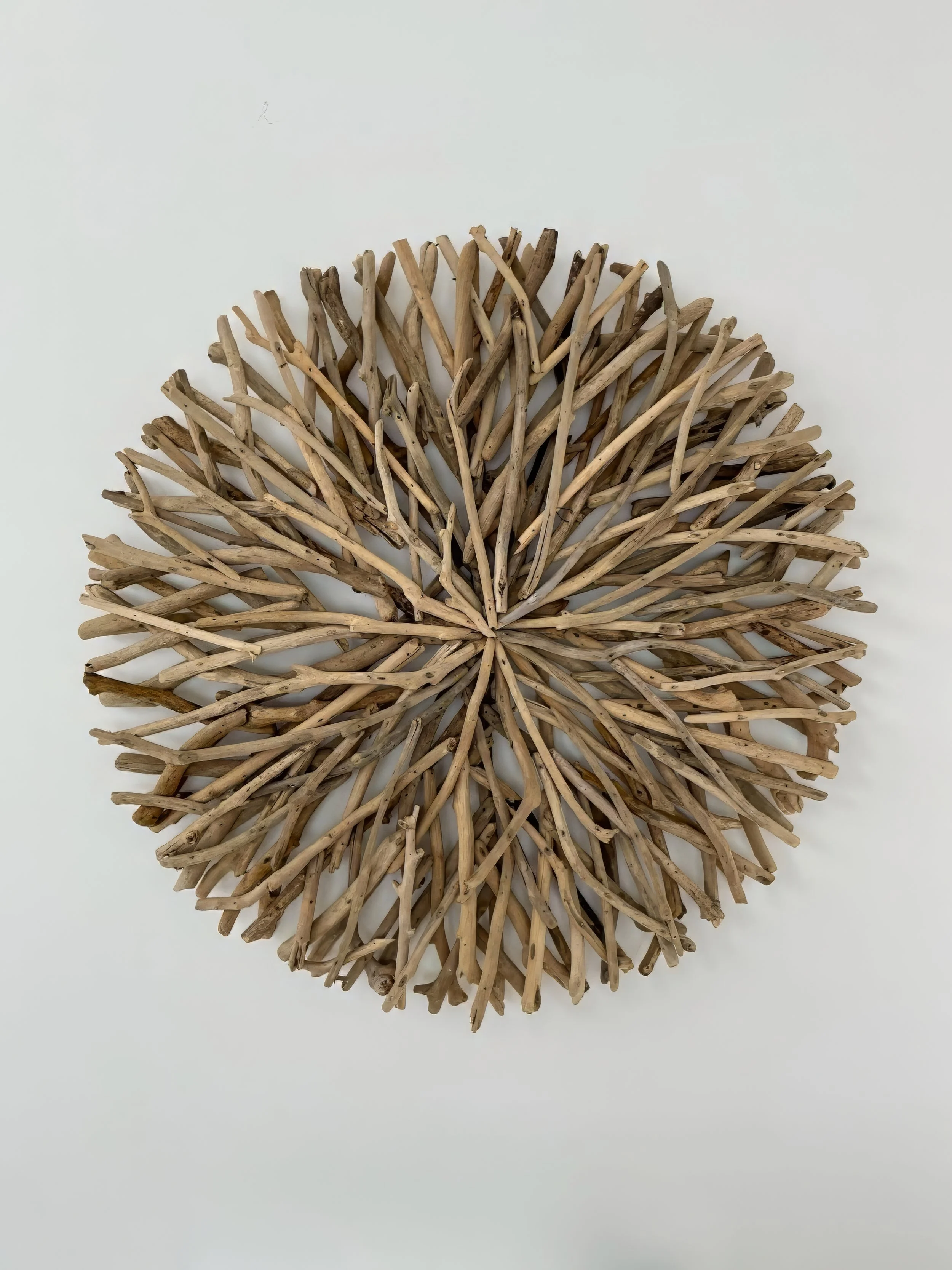 Handcrafted driftwood wall art, luxury new home interior Elite Building Northland