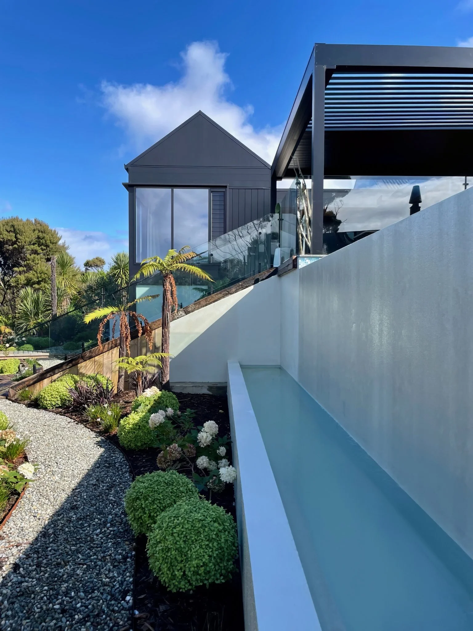 Sand Dune luxury new home waterfall feature, Elite Building Mangawhai