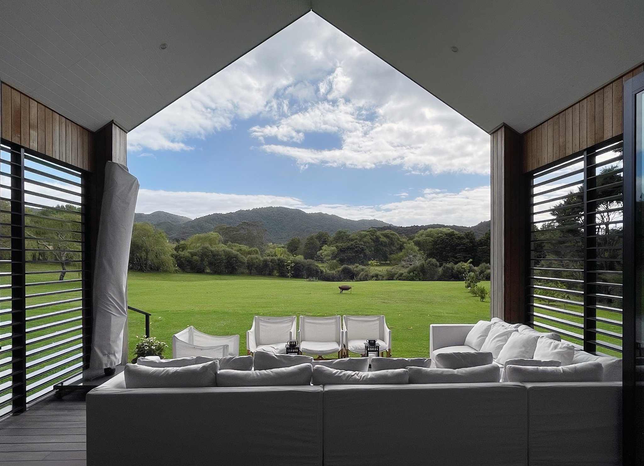 Outdoor living framing rural views, Waiotahi Drive new home Elite Building Mangawhai