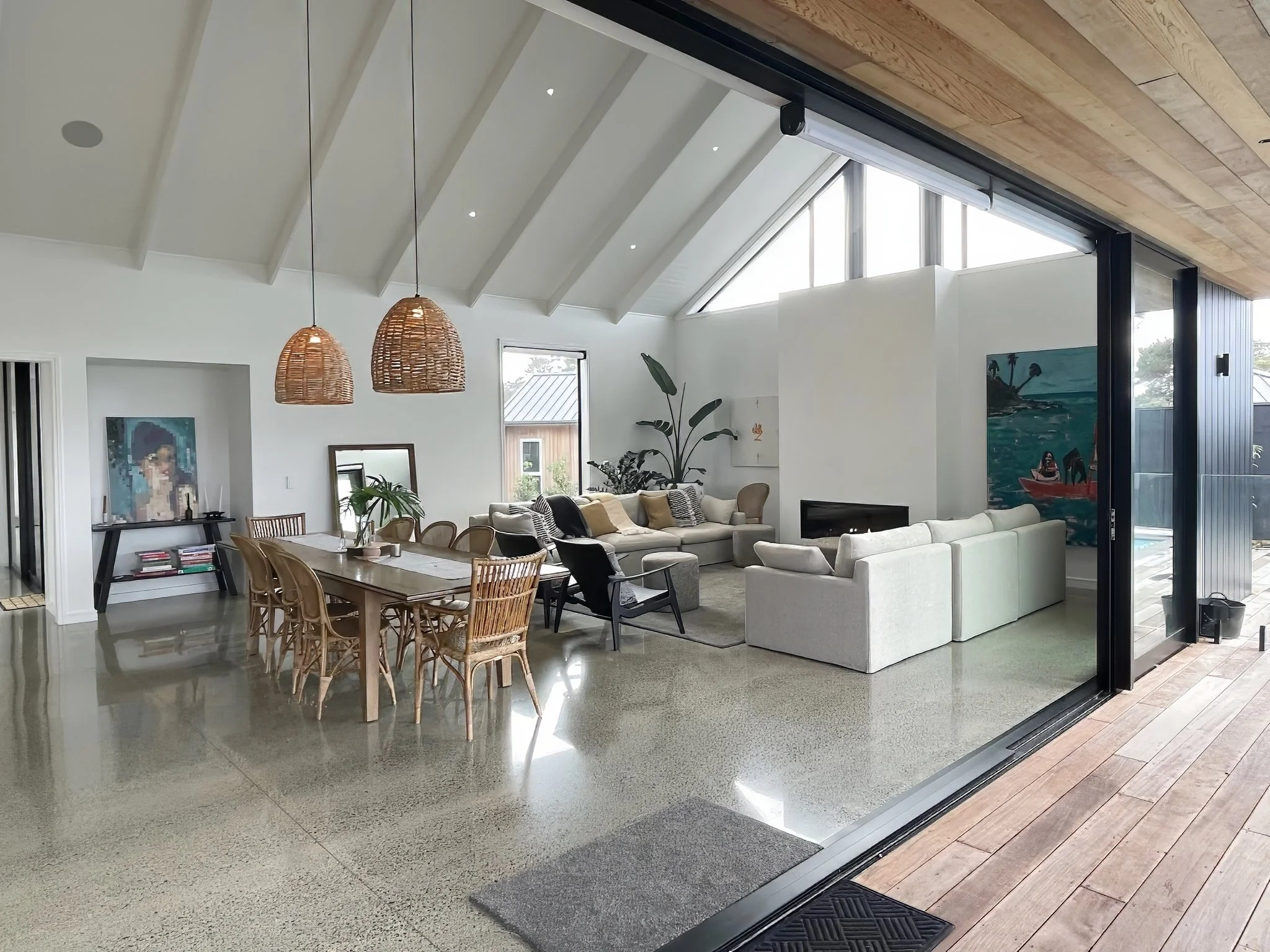 Sand Dune luxury open plan living and kitchen with polished concrete floors, Mangawhai