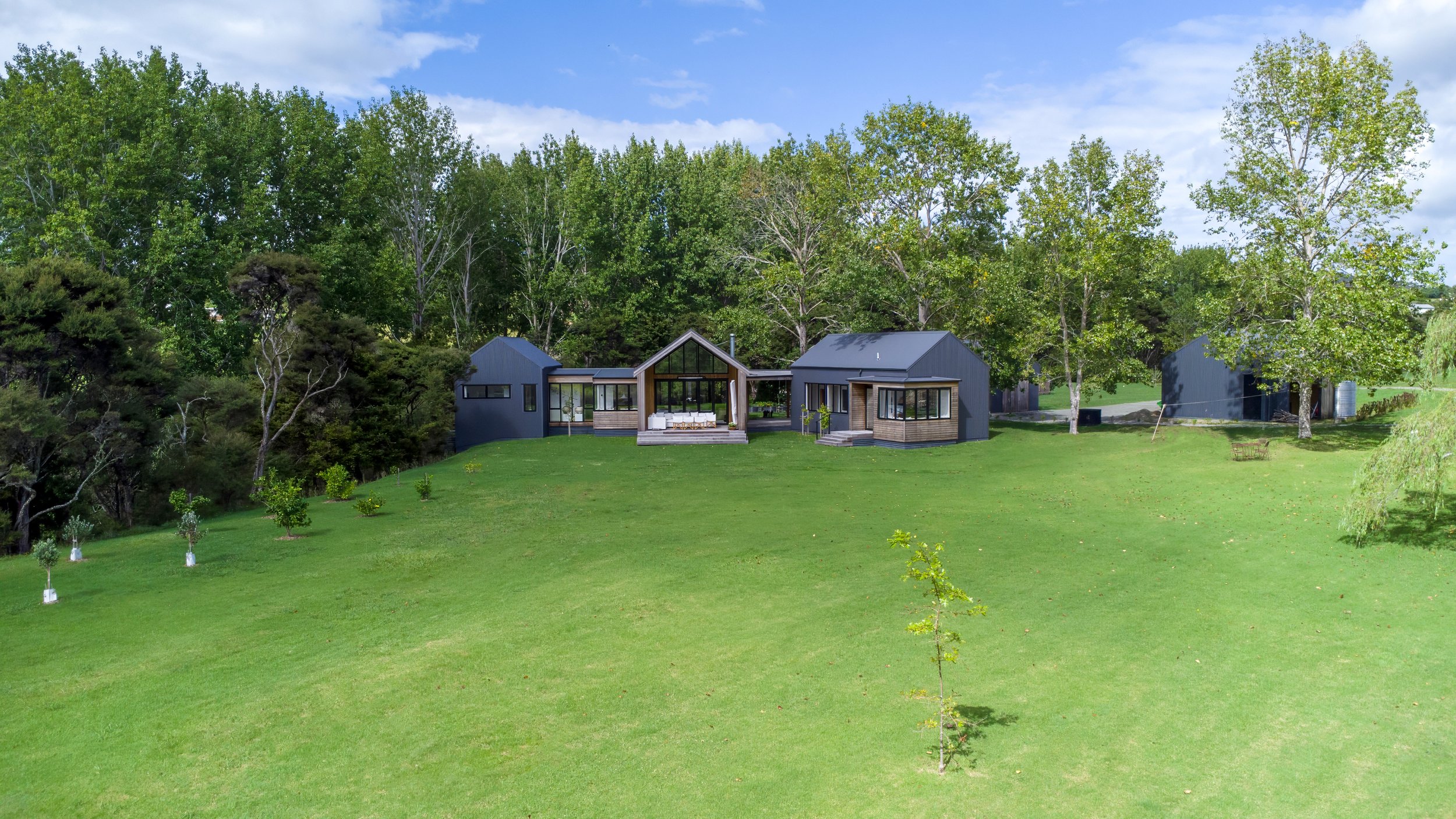 New home build on rural section, Elite Building Mangawhai Northland exterior drone arial