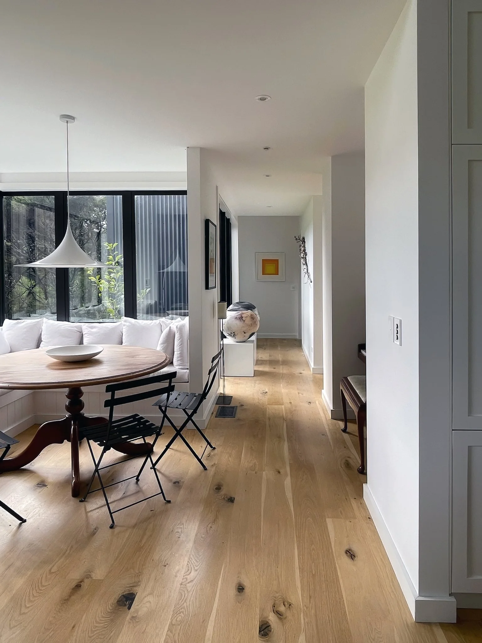 Open plan hallway and breakfast nook with timber flooring, Waiotahi Drive Elite Building Northland 